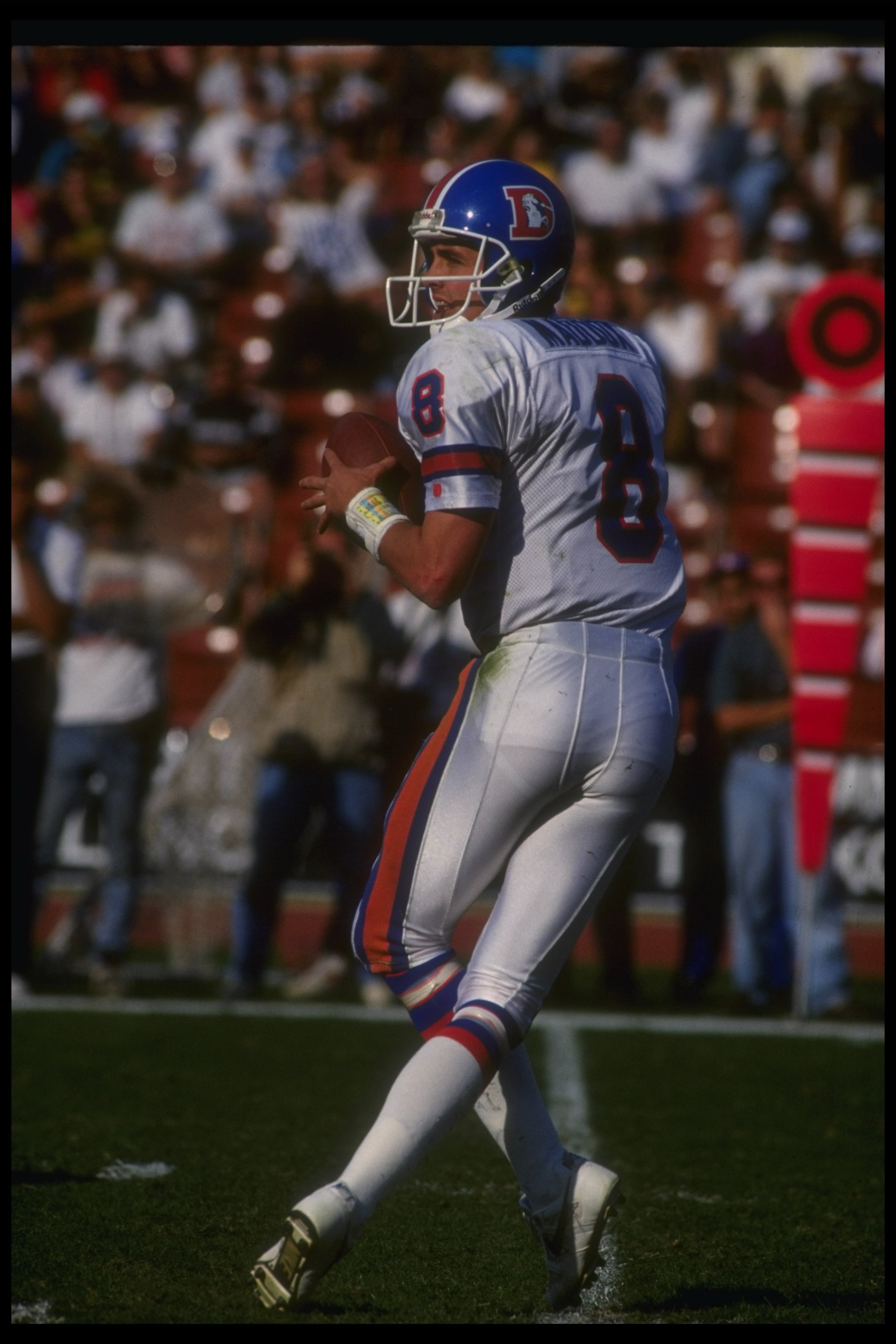 Seattle Seahawks - Seahawks quarterback Rick Mirer attempts to elude  Derrick Thomas during an NFL Football game against the Kansas City Chiefs  on January 2, 1994 in Kansas City, Missouri.