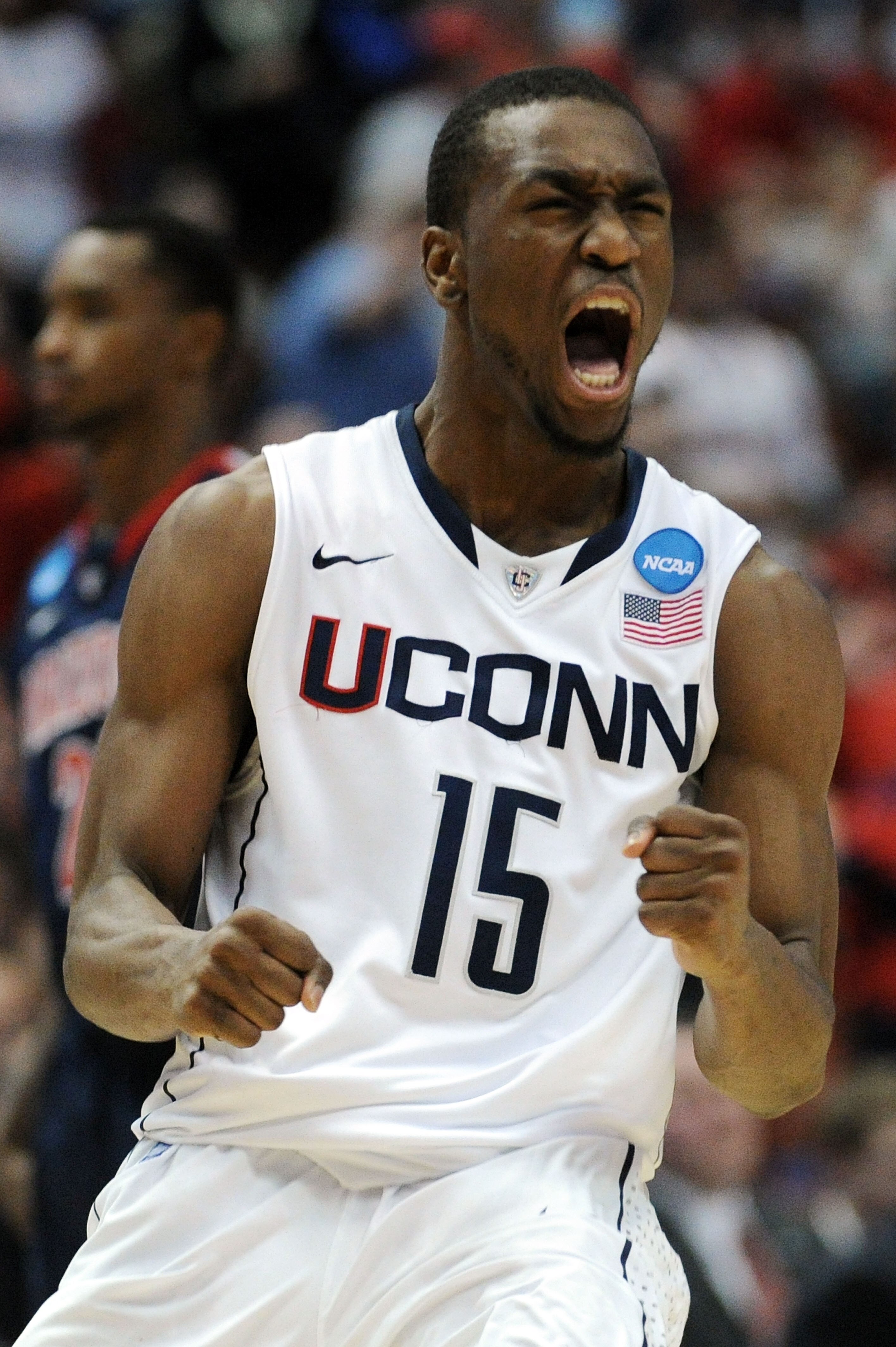ANAHEIM, CA - MARCH 26:  Kemba Walker #15 of the Connecticut Huskies celebrates after a play towards the end of the game against the Arizona Wildcats during the west regional final of the 2011 NCAA men's basketball tournament at the Honda Center on March