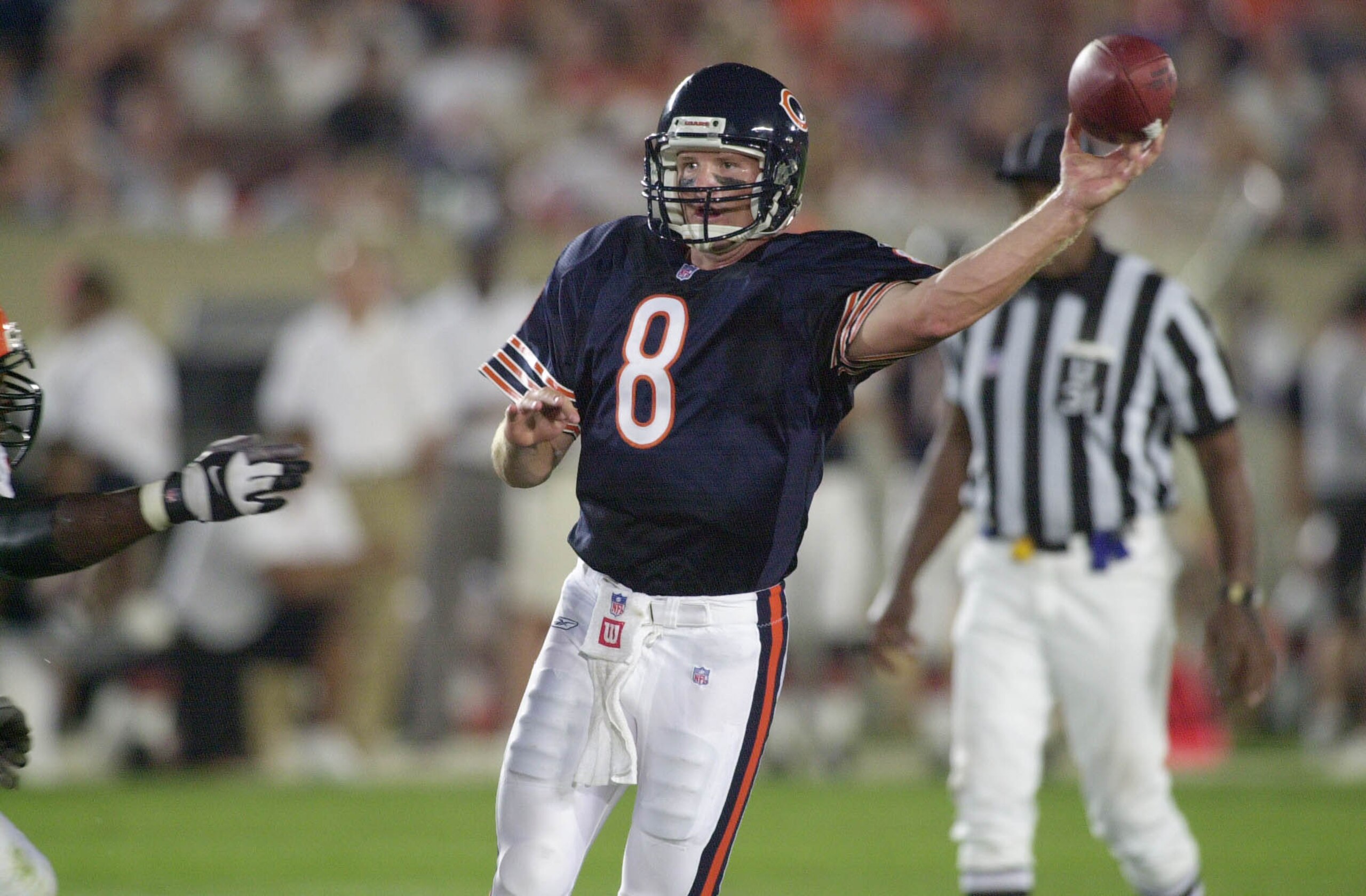 04 Aug 2001:  Cade McNown #8 of the Chicago Bears passses against the defense of the Cincinnati Bengals during the NFL pre-season game at Soldier Field in Chicago, IL. The Bears defeated the Bengals 16-13 in overtime. DIGITAL IMAGE Mandatory Credit: Jonat