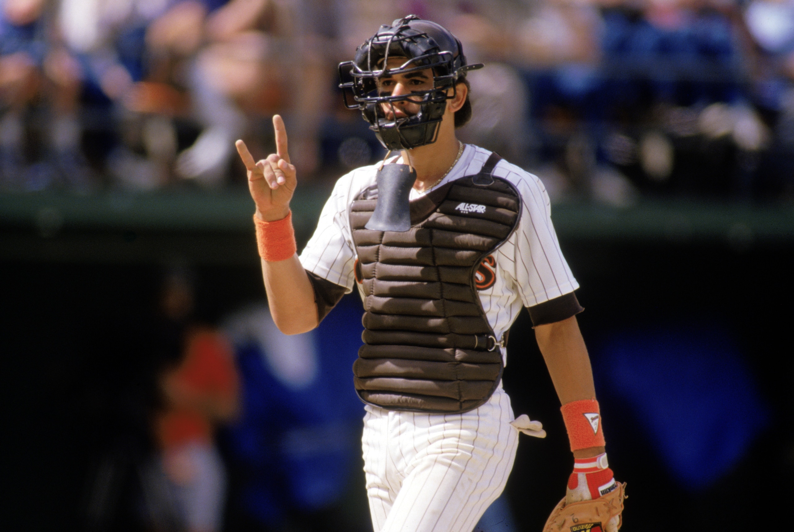 1987:  Benito Santiago of the San Diego Padres celebrates during the 1987 season. (Photo by Stephen Dunn/Getty Images)