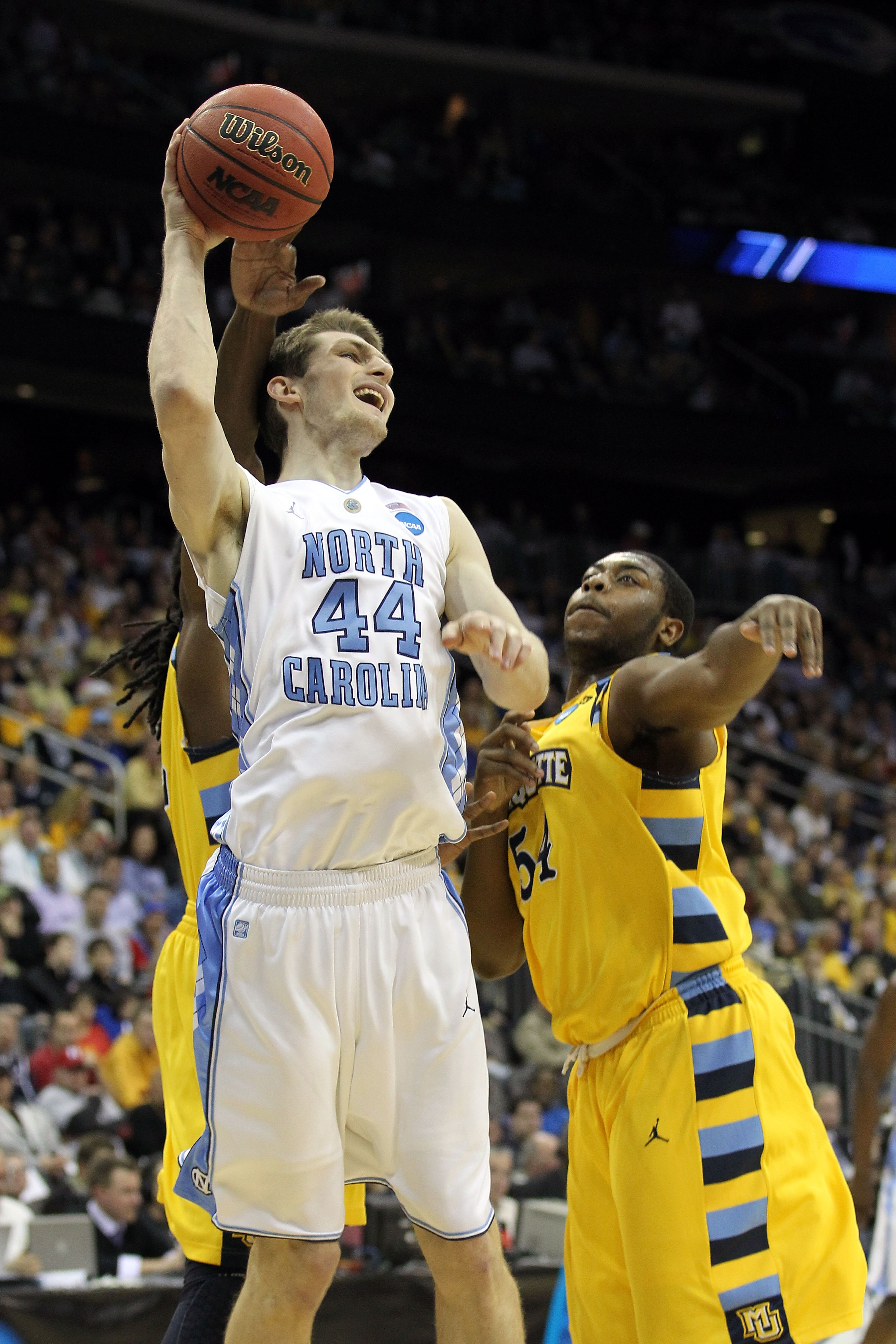 NEWARK, NJ - MARCH 25:  Tyler Zeller #44 of the North Carolina Tar Heels in action against the Marquette Golden Eagles during the east regional semifinal of the 2011 NCAA Men's Basketball Tournament at the Prudential Center on March 25, 2011 in Newark, Ne