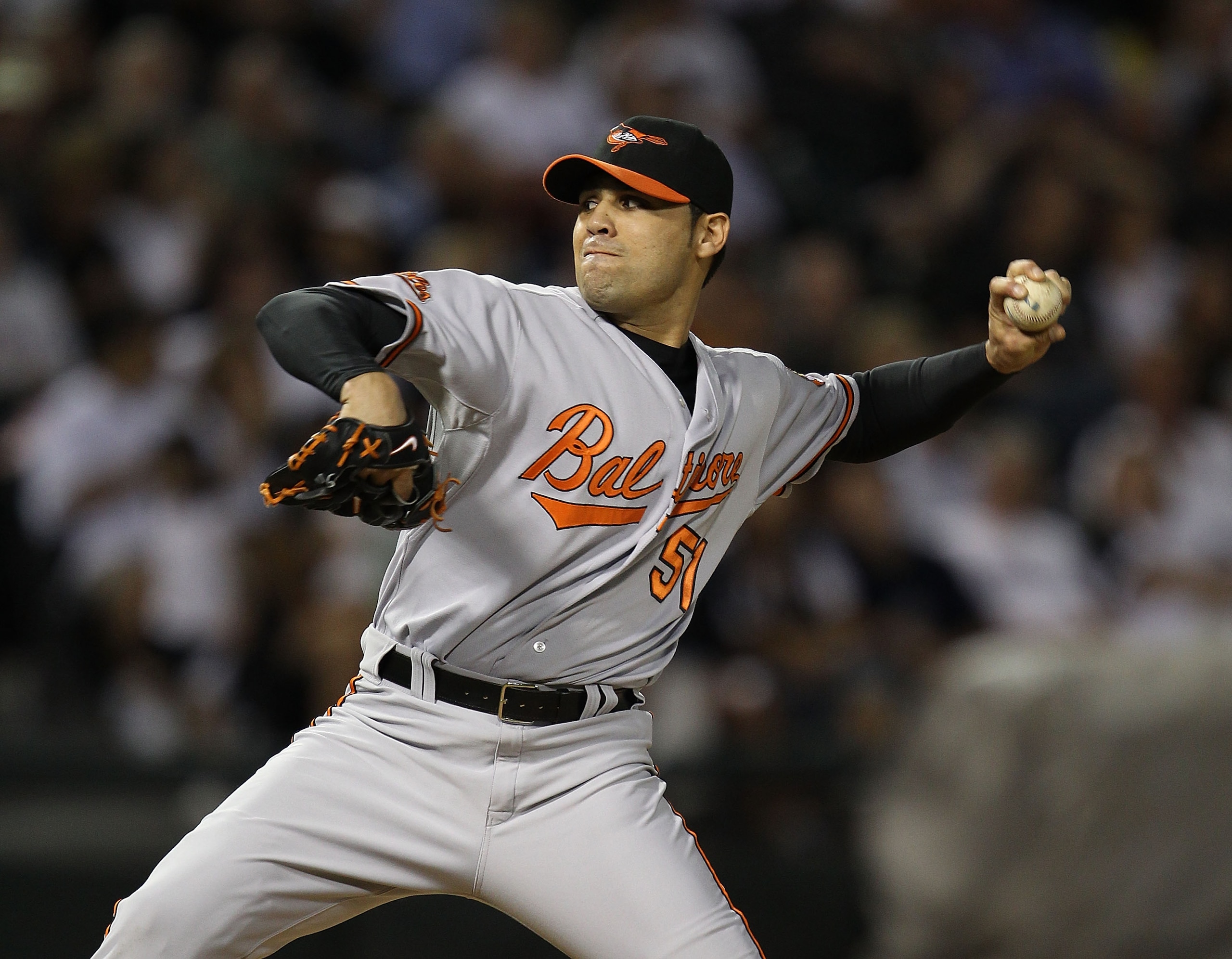 CHICAGO - AUGUST 25: Michael Gonzalez #51 of the Baltimore Orioles pitches against the Chicago White Sox at U.S. Cellular Field on August 25, 2010 in Chicago, Illinois. The Orioles defeated the White Sox 4-2. (Photo by Jonathan Daniel/Getty Images)