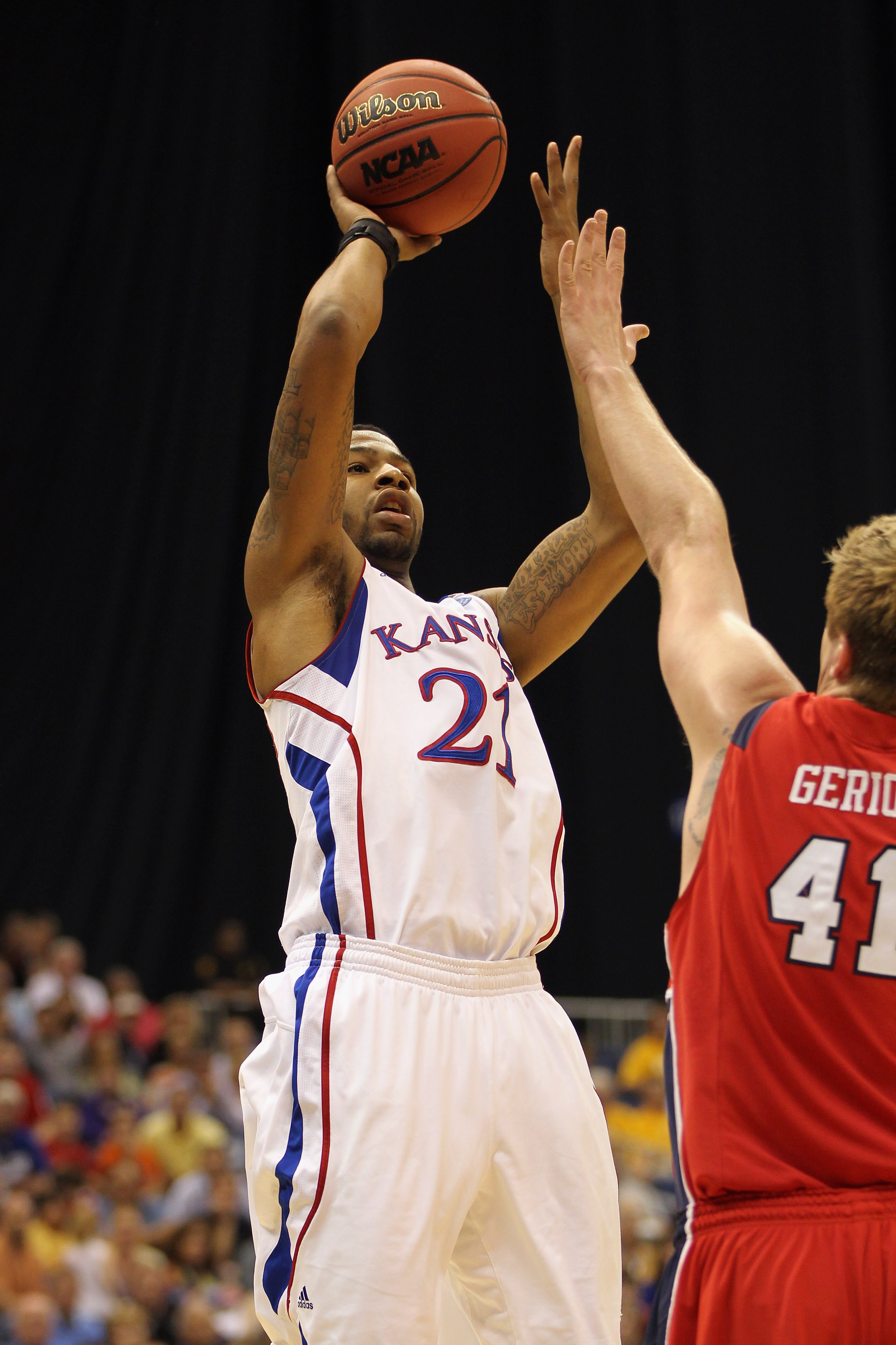 SAN ANTONIO, TX - MARCH 25:  Markieff Morris #21 of the Kansas Jayhawks puts up a shot against the Richmond Spiders during the southwest regional of the 2011 NCAA men's basketball tournament at the Alamodome on March 25, 2011 in San Antonio, Texas.  (Phot
