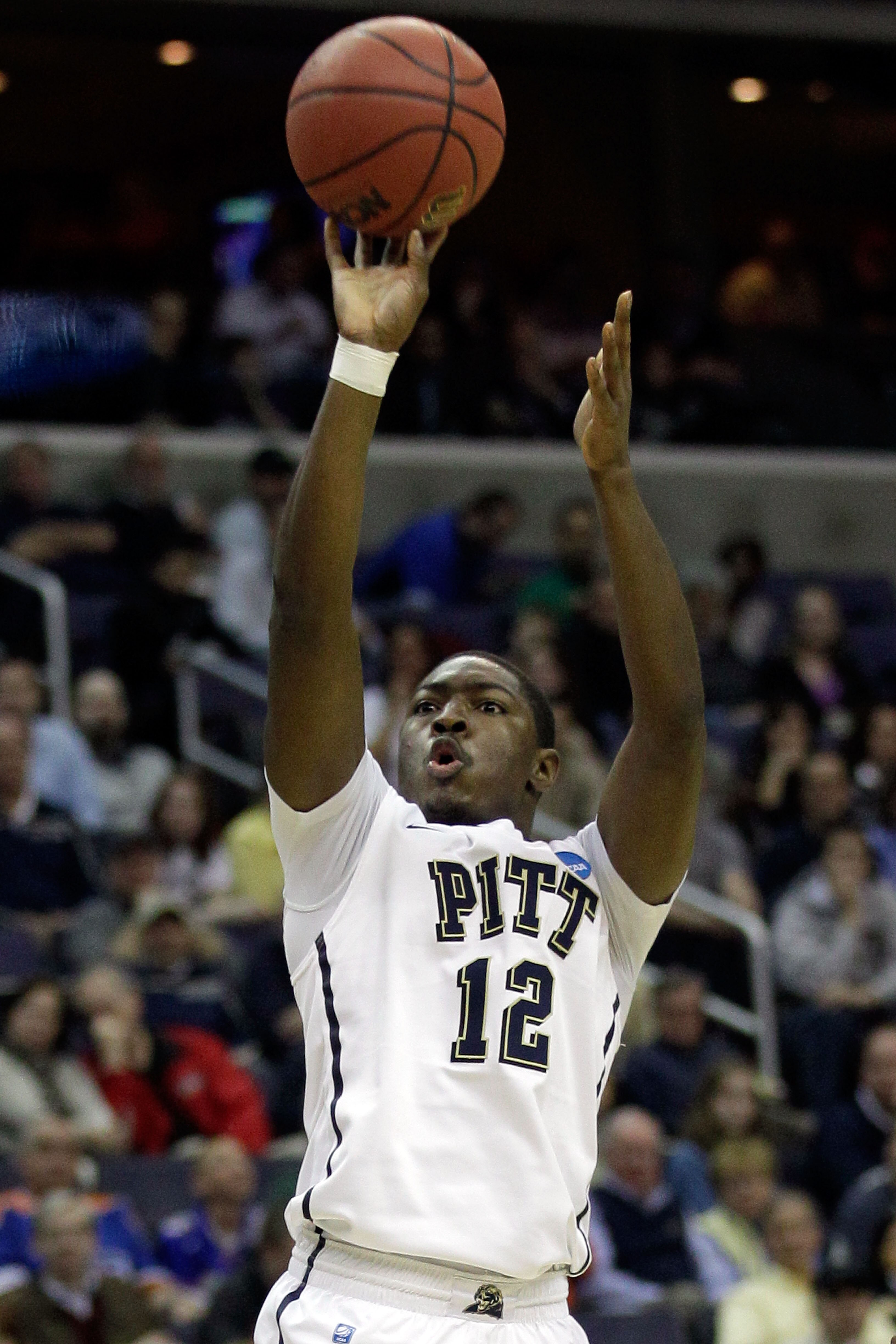 WASHINGTON - MARCH 19:  Ashton Gibbs #12 of the Pittsburgh Panthers puts up a shot against the Butler Bulldogs during the third round of the 2011 NCAA men's basketball tournament at Verizon Center on March 19, 2011 in Washington, DC.  (Photo by Rob Carr/G