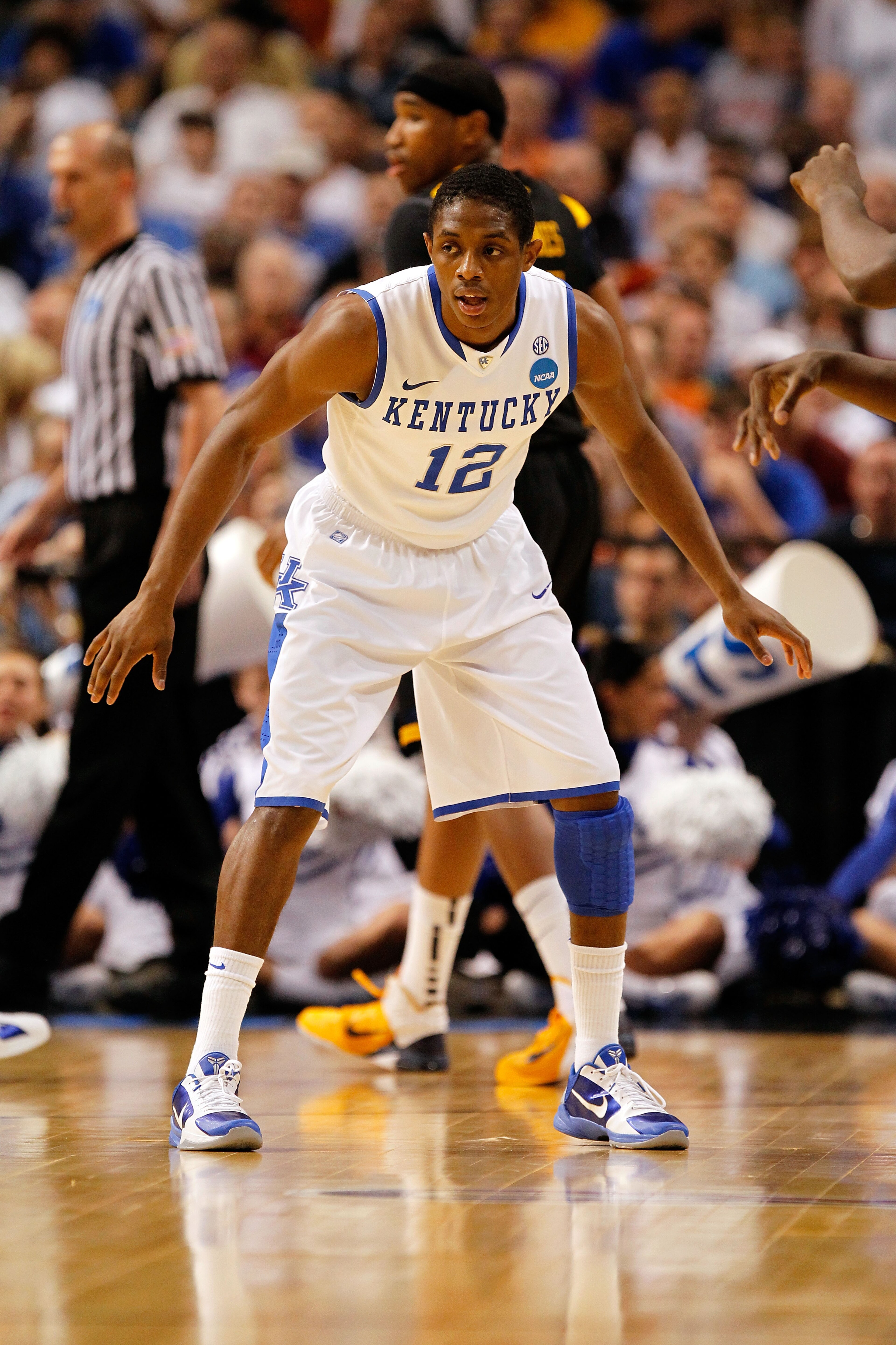 TAMPA, FL - MARCH 19: Brandon Knight #12 of the Kentucky Wildcats defends against the West Virginia Mountaineers during the third round of the 2011 NCAA men's basketball tournament at St. Pete Times Forum on March 19, 2011 in Tampa, Florida. Kentucky won TAMPA, FL - MARCH 19: Brandon Knight #12 of the Kentucky Wildcats defends against the West Virginia Mountaineers during the third round of the 2011 NCAA men's basketball tournament at St. Pete Times Forum on March 19, 2011 in Tampa, Florida. Kentucky won