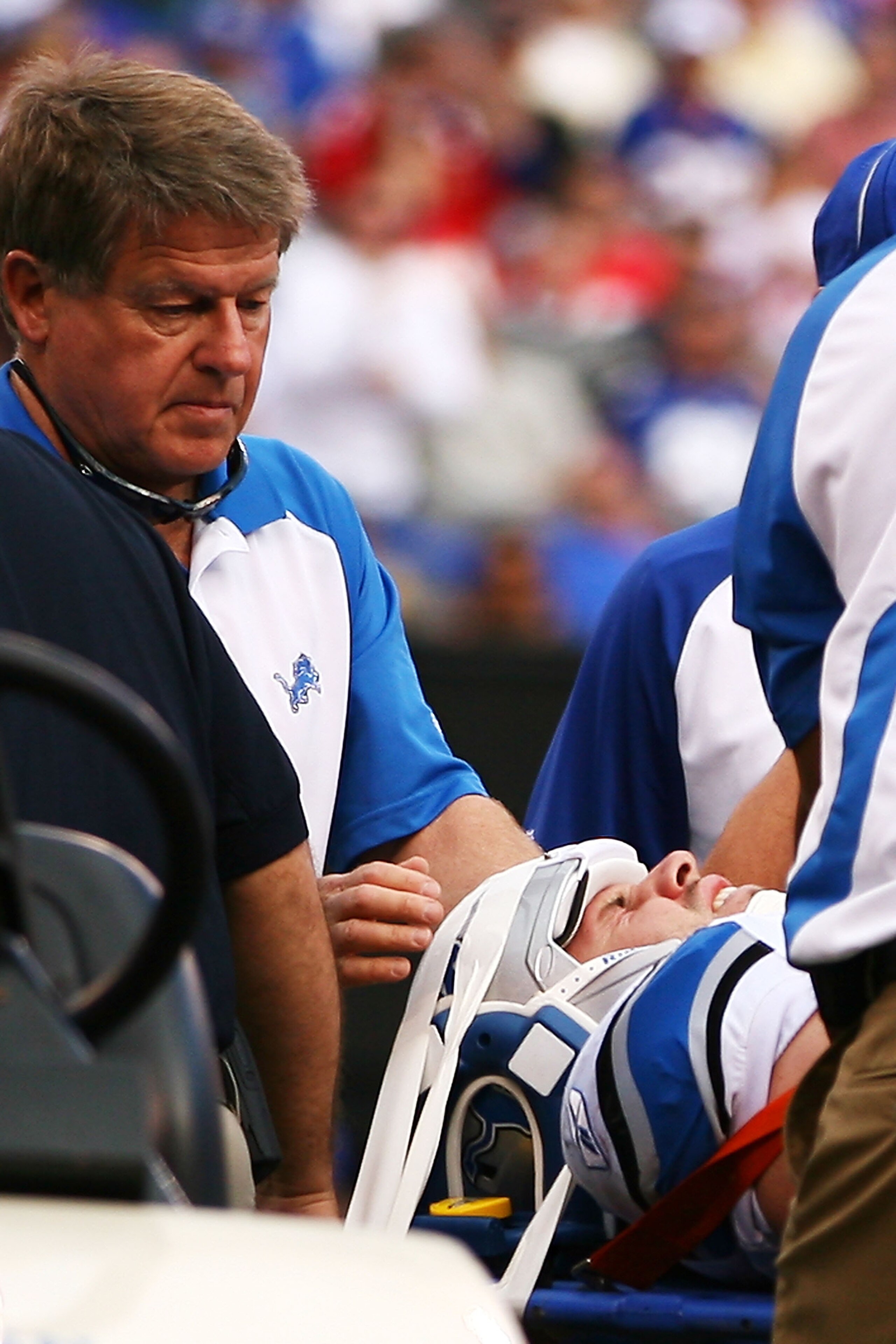 EAST RUTHERFORD, NJ - OCTOBER 17: Zack Follett #49  of the Detroit Lions is taken off the field on a stretcher after being injured on a punt return against the New York Giants at New Meadowlands Stadium on October 17, 2010 in East Rutherford, New Jersey.