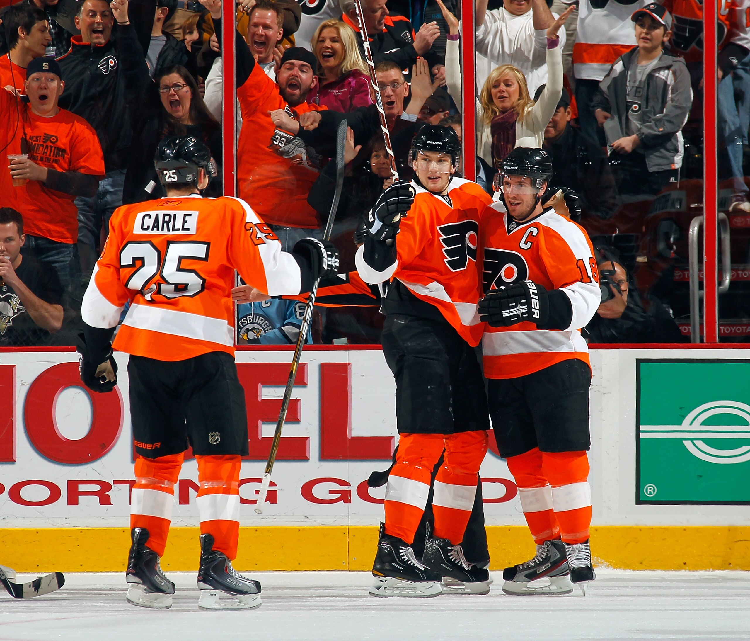 PHILADELPHIA - MARCH 24:  Mike Richards #18 and James van Riemsdyk #21 of the Philadelphia Flyers celebrate Richards' first period goal against the Pittsburgh Penguins on March 24, 2011 at the Wells Fargo Center in Philadelphia, Pennsylvania.  (Photo by L