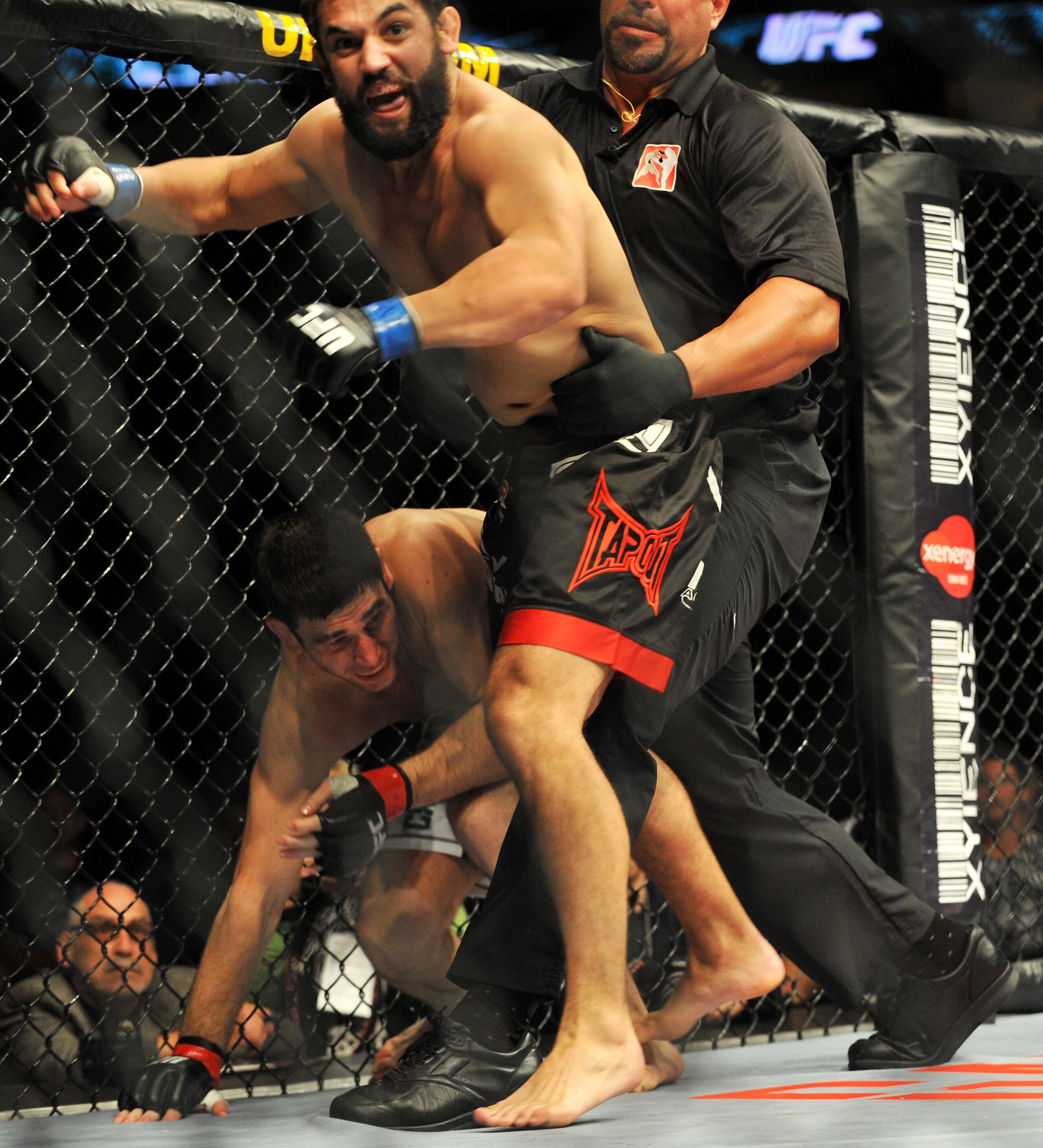 PHILADELPHIA - AUGUST 08: (Front) Johny Hendricks battles Amir Sadollah during their Welterweight bout at UFC 101: Declaration at the Wachovia Center on August 8, 2009 in Philadelphia, Pennsylvania. Hendricks defeated Amir Sadollah by unanimous decisio PHILADELPHIA - AUGUST 08: (Front) Johny Hendricks battles Amir Sadollah during their Welterweight bout at UFC 101: Declaration at the Wachovia Center on August 8, 2009 in Philadelphia, Pennsylvania. Hendricks defeated Amir Sadollah by unanimous decisio