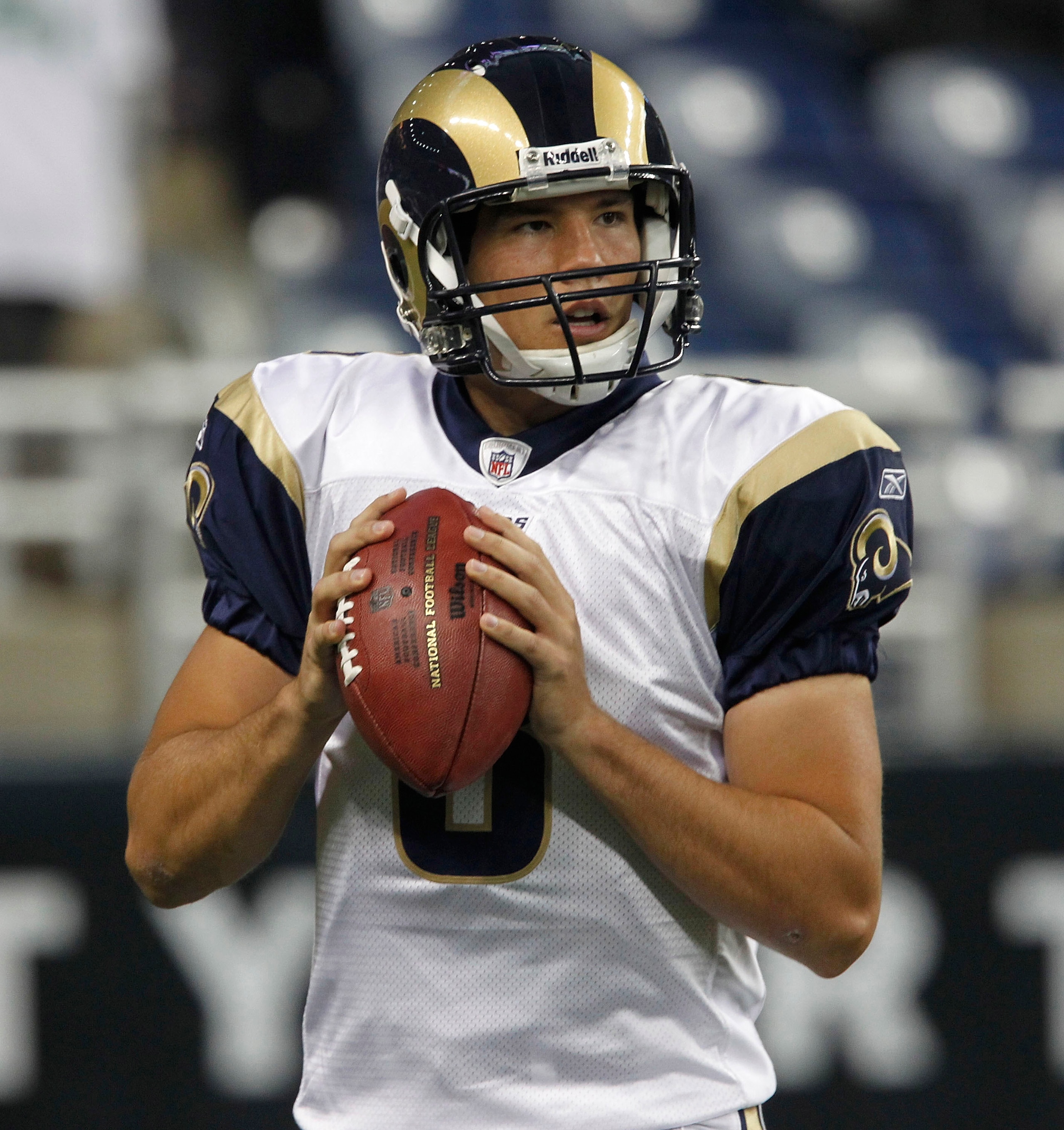 DETROIT - OCTOBER 10:  Sam Bradford #8 of the St. Louis Rams warms up prior to the start of the game against the Detroit Lions at Ford Field on October 10, 2010 in Detroit, Michigan.  (Photo by Leon Halip/Getty Images)