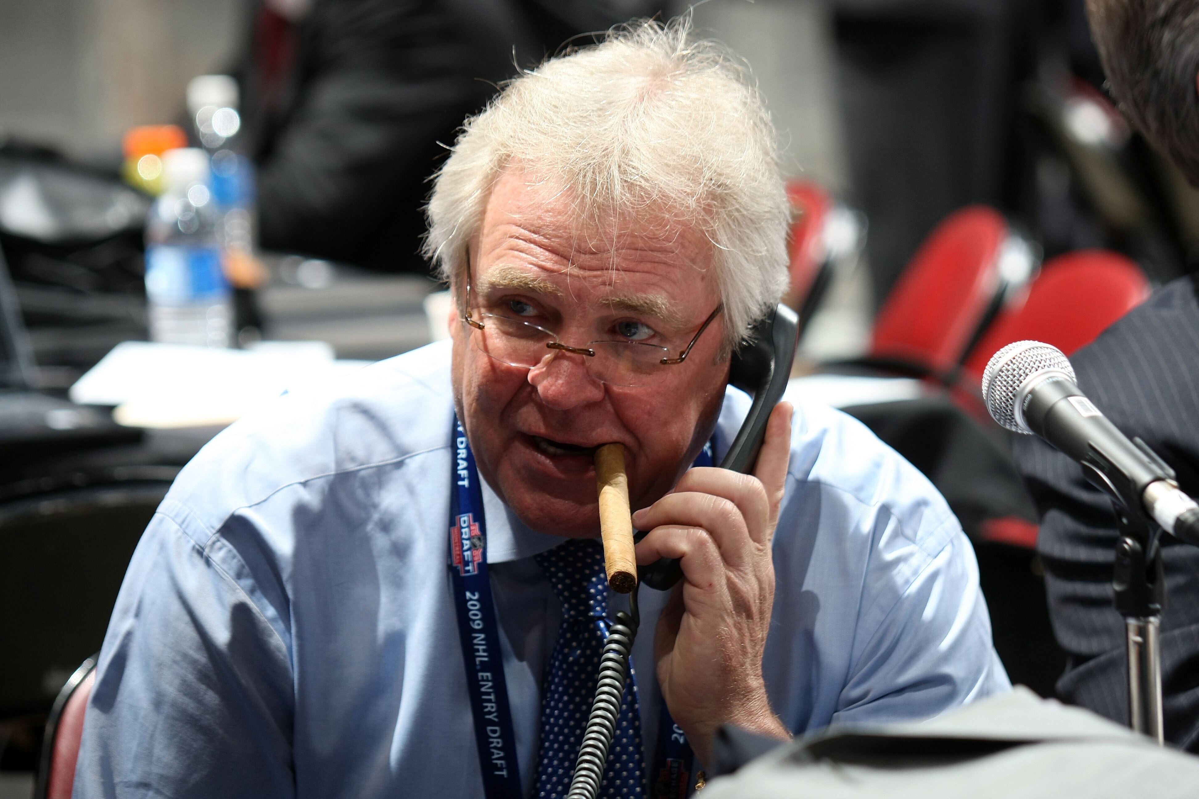 MONTREAL, QC - JUNE 27: General Manager and President Glen Sather of the New York Rangers works the phones during the 2009 NHL Entry Draft at the Bell Centre on June 27, 2009 in Montreal, Quebec, Canada. (Photo by Bruce Bennett/Getty Images) MONTREAL, QC - JUNE 27: General Manager and President Glen Sather of the New York Rangers works the phones during the 2009 NHL Entry Draft at the Bell Centre on June 27, 2009 in Montreal, Quebec, Canada. (Photo by Bruce Bennett/Getty Images)
