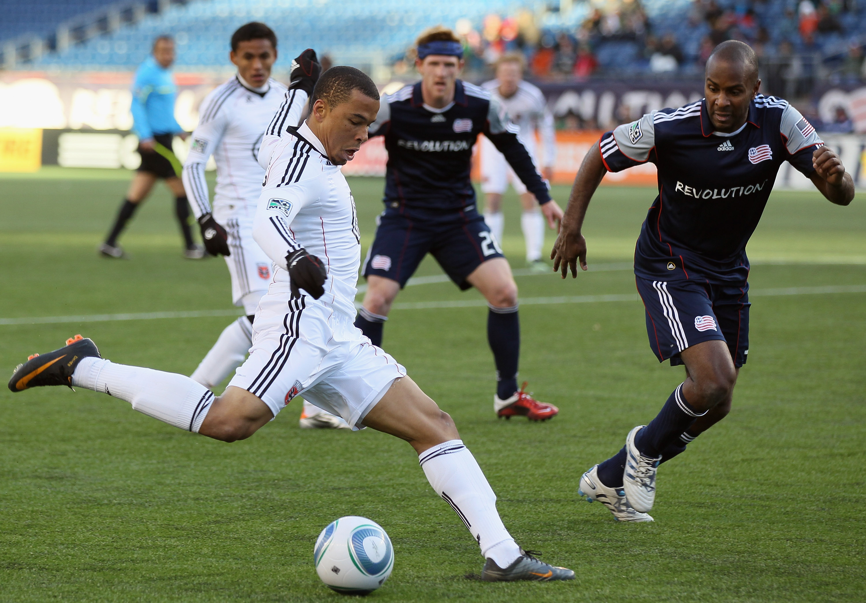 FOXBORO, MA - MARCH 26: Charlie Davies #9 of DC United and Didier Domi #3 of the New England Revolution fight for the ball on March 26, 2011 at Gillette Stadium in Foxboro, Massachusetts. The Revolution defeated DC United 2-1. (Photo by Elsa/Getty Image