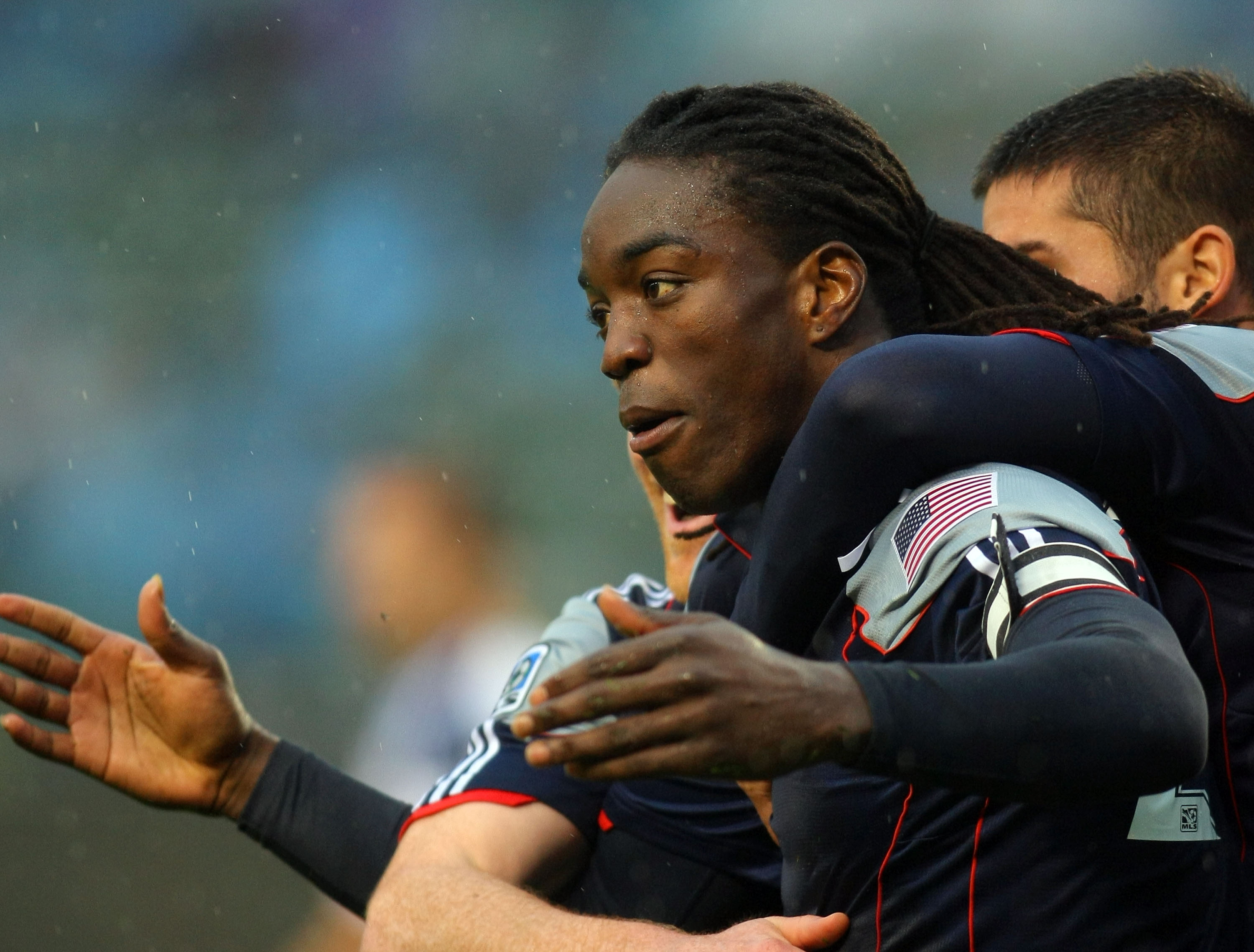 CARSON, CA - MARCH 20: Shalrie Joseph #21 of the New England Revolution celebrates his first half goal with teammates during the MLS match against the Los Angeles Galaxy in the first half at The Home Depot Center on March 20, 2011 in Carson, California.