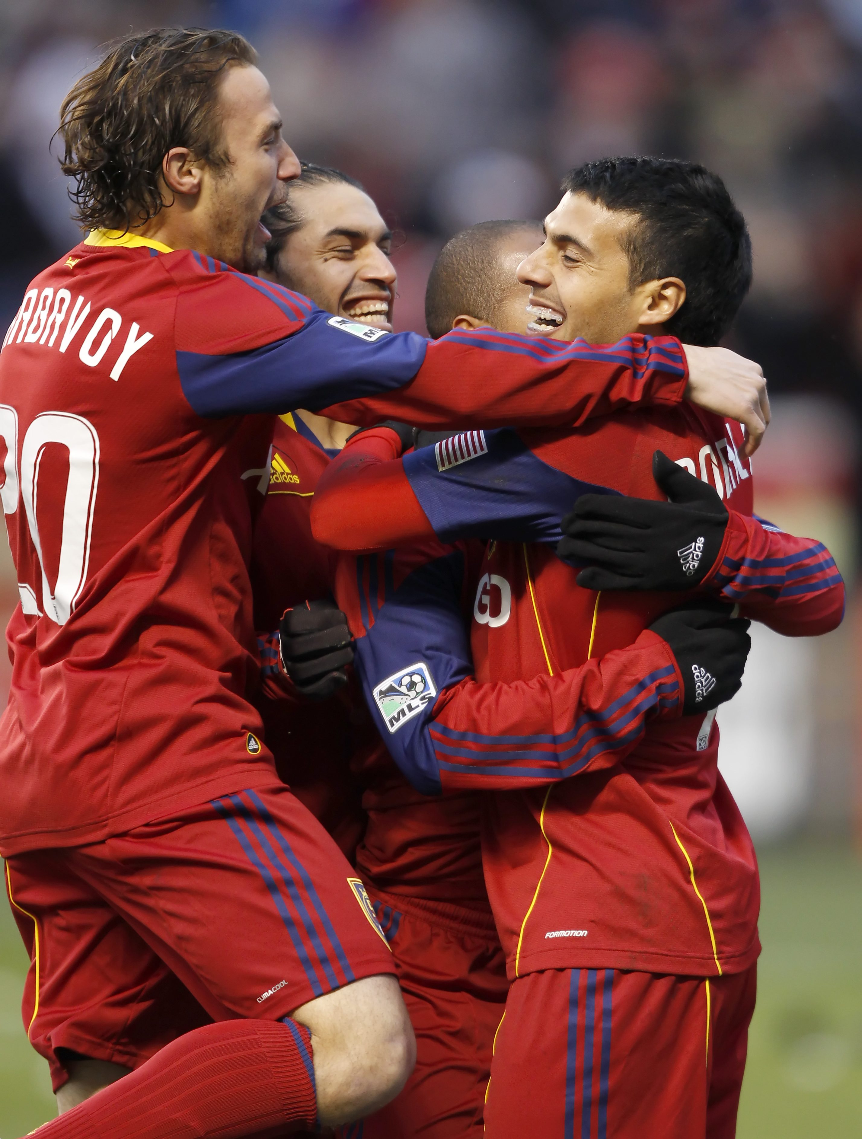 SANDY, UT - MARCH 26: Ned Grabavoy #20, Fabian Espindola #7, Andy Williams #77 and Javier Morales #11 of Real Salt Lake celebrate a gaol during a game against the Los Angeles Galaxy during the first half of an MLS soccer game March 26, 2011 at Rio Tinto S