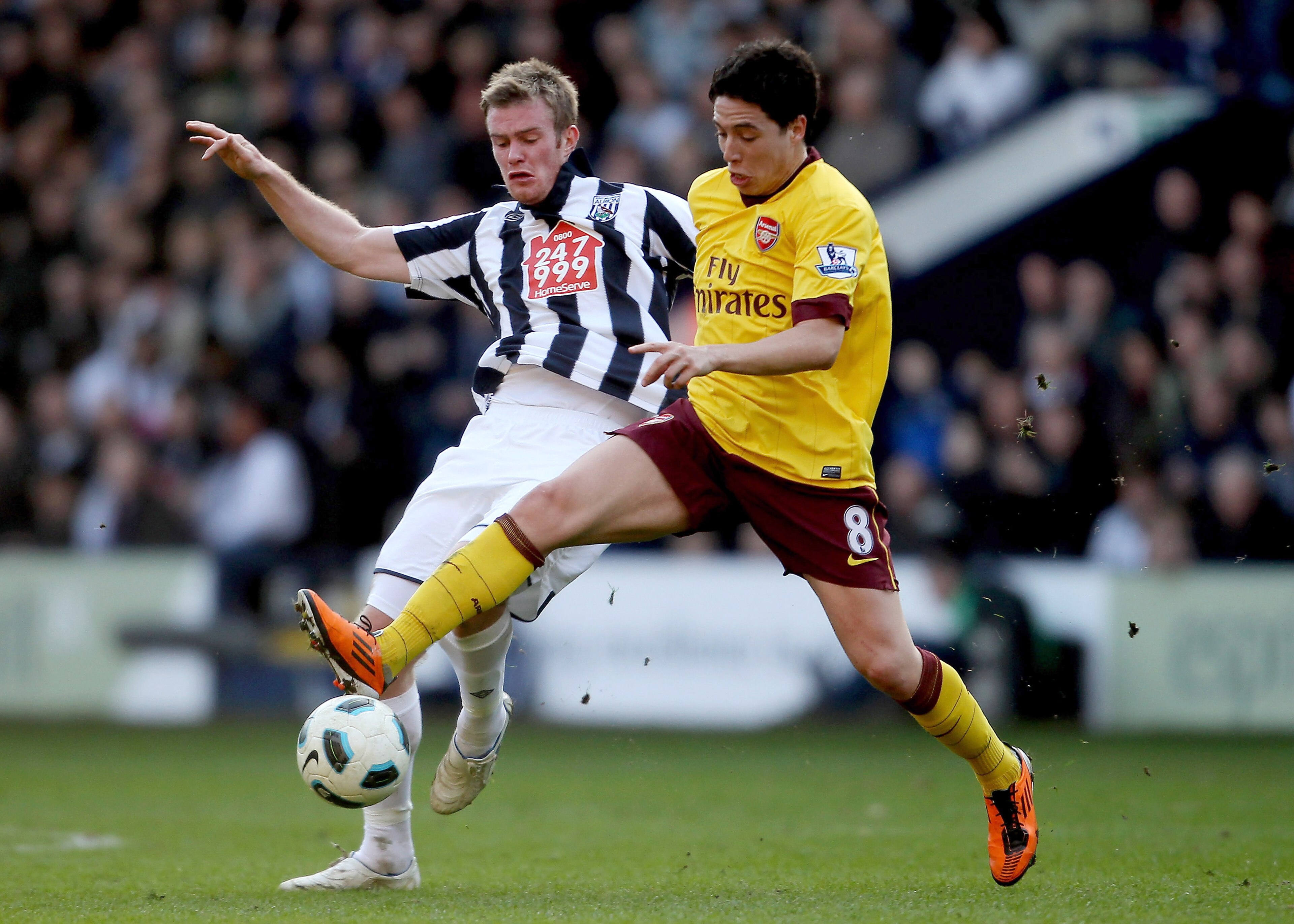 WEST BROMWICH, ENGLAND - MARCH 19: Chris Brunt of WBA (L) in action with Samir Nasri of Arsenal during the Barclays Premier League match between West Bromwich Albion and Arsenal at The Hawthorns on March 19, 2011 in West Bromwich, England. (Photo by Sco WEST BROMWICH, ENGLAND - MARCH 19: Chris Brunt of WBA (L) in action with Samir Nasri of Arsenal during the Barclays Premier League match between West Bromwich Albion and Arsenal at The Hawthorns on March 19, 2011 in West Bromwich, England. (Photo by Sco
