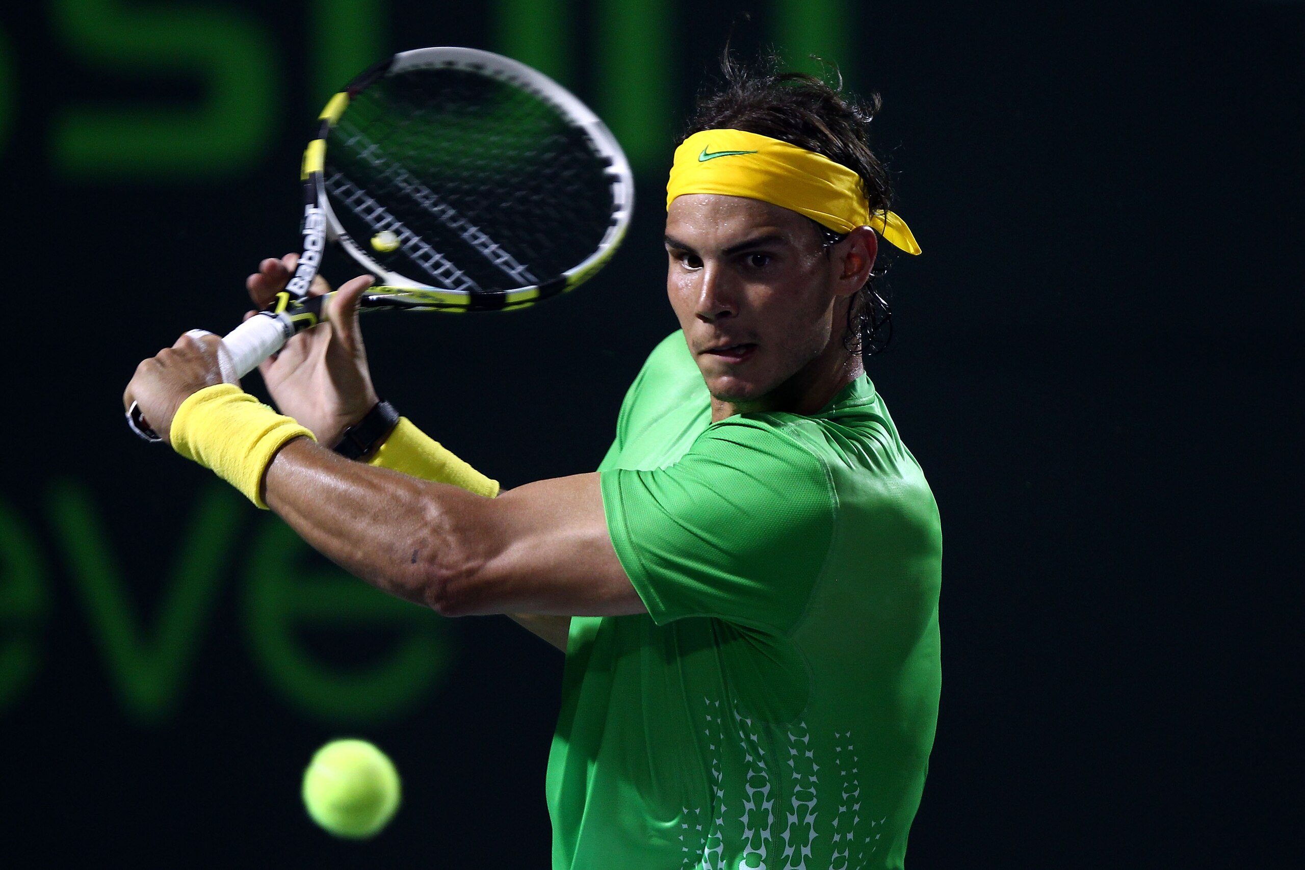 KEY BISCAYNE, FL - MARCH 26:  Rafael Nadal of Spain hits a return shot against Kei Nishikori of Japan during the Sony Ericsson Open at Crandon Park Tennis Center on March 26, 2011 in Key Biscayne, Florida.  (Photo by Clive Brunskill/Getty Images)