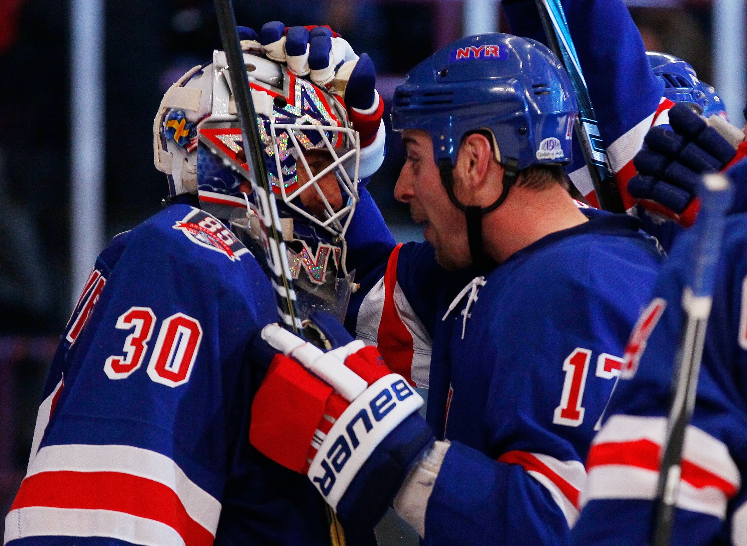NEW YORK - MARCH 22:  Brandon Dubinsky #17 of the New York Rangers celebrates with goaltender Henrik Lundqvist #30 after defeating the Florida Panthers on March 22, 2011 at Madison Square Garden in New York City, New York. Rangers defeated the Panthers 1-