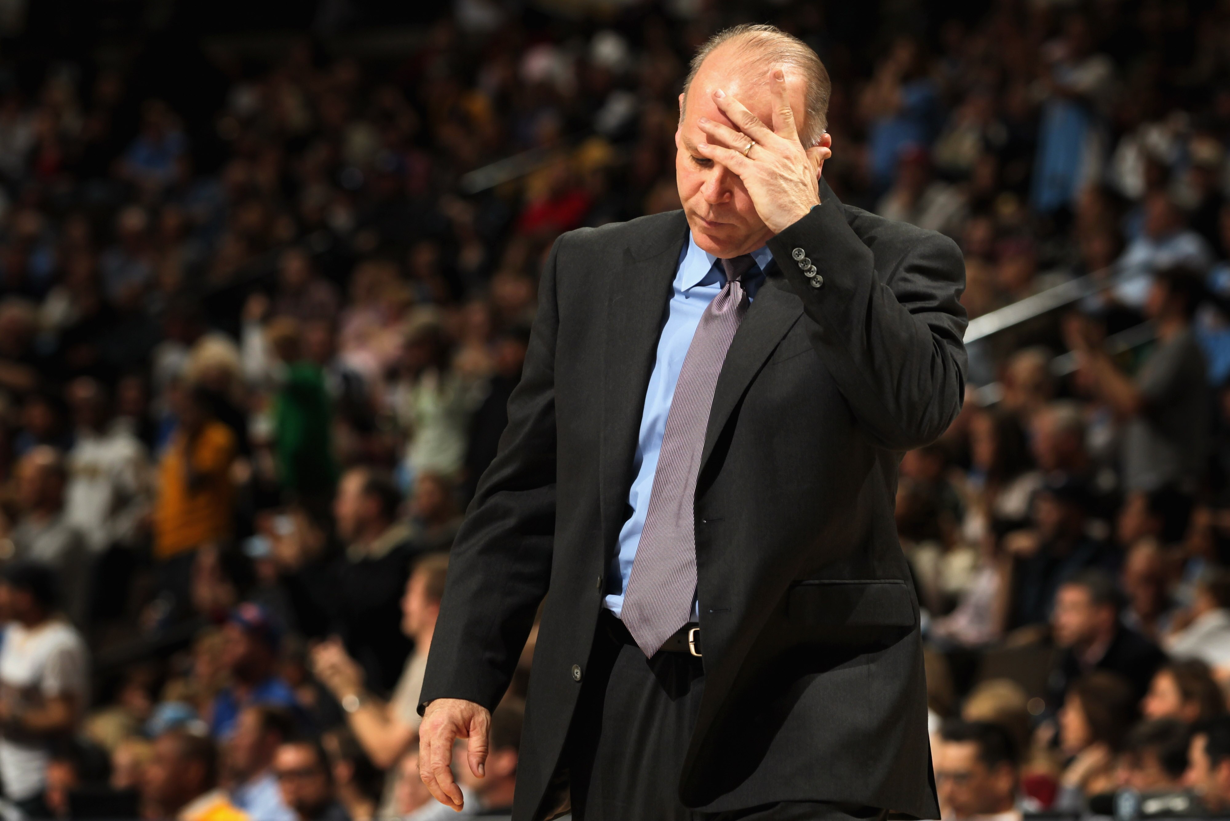 DENVER, CO - MARCH 12:  Head coach John Kuester of the Detroit Pistons reacts during a time out against the Denver Nuggets at the Pepsi Center on March 12, 2011 in Denver, Colorado. The Nuggets defeated the Pistons 131-101.  NOTE TO USER: User expressly a