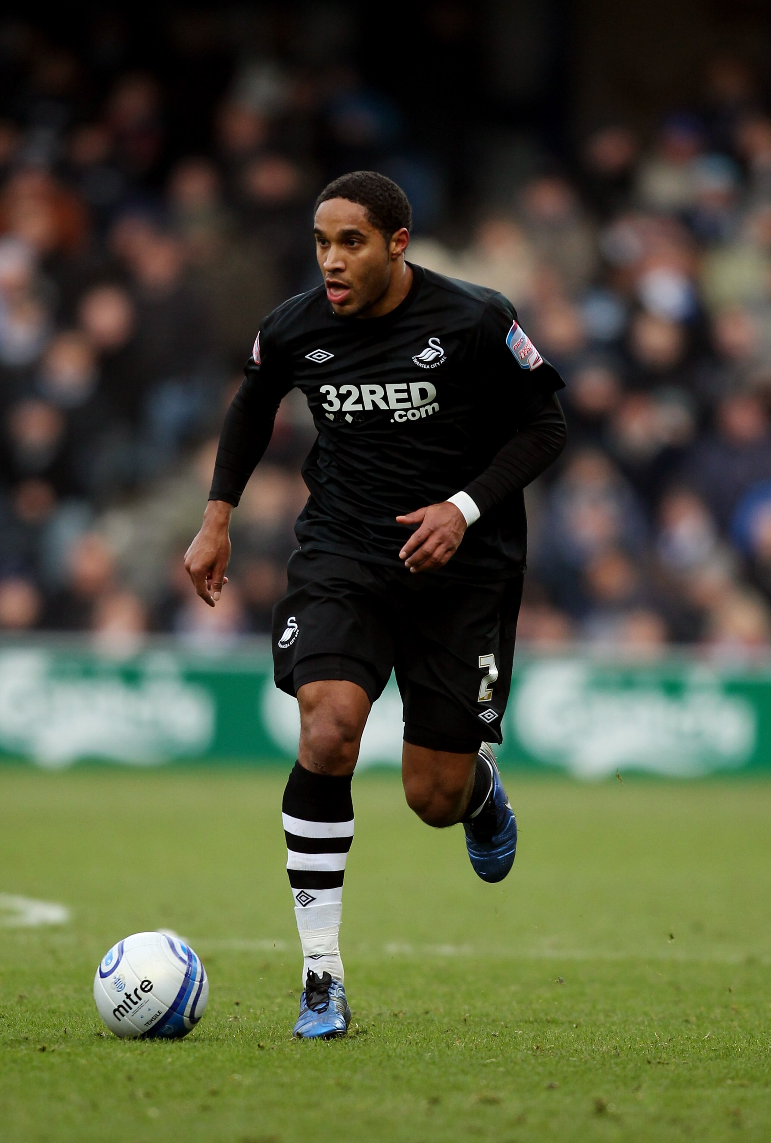 LONDON, ENGLAND - DECEMBER 26:  Ashley Williams of Swansea City in action during the npower Championship match between Queens Park Rangers and Swansea City at Loftus Road on December 26, 2010 in London, England.  (Photo by Warren Little/Getty Images)