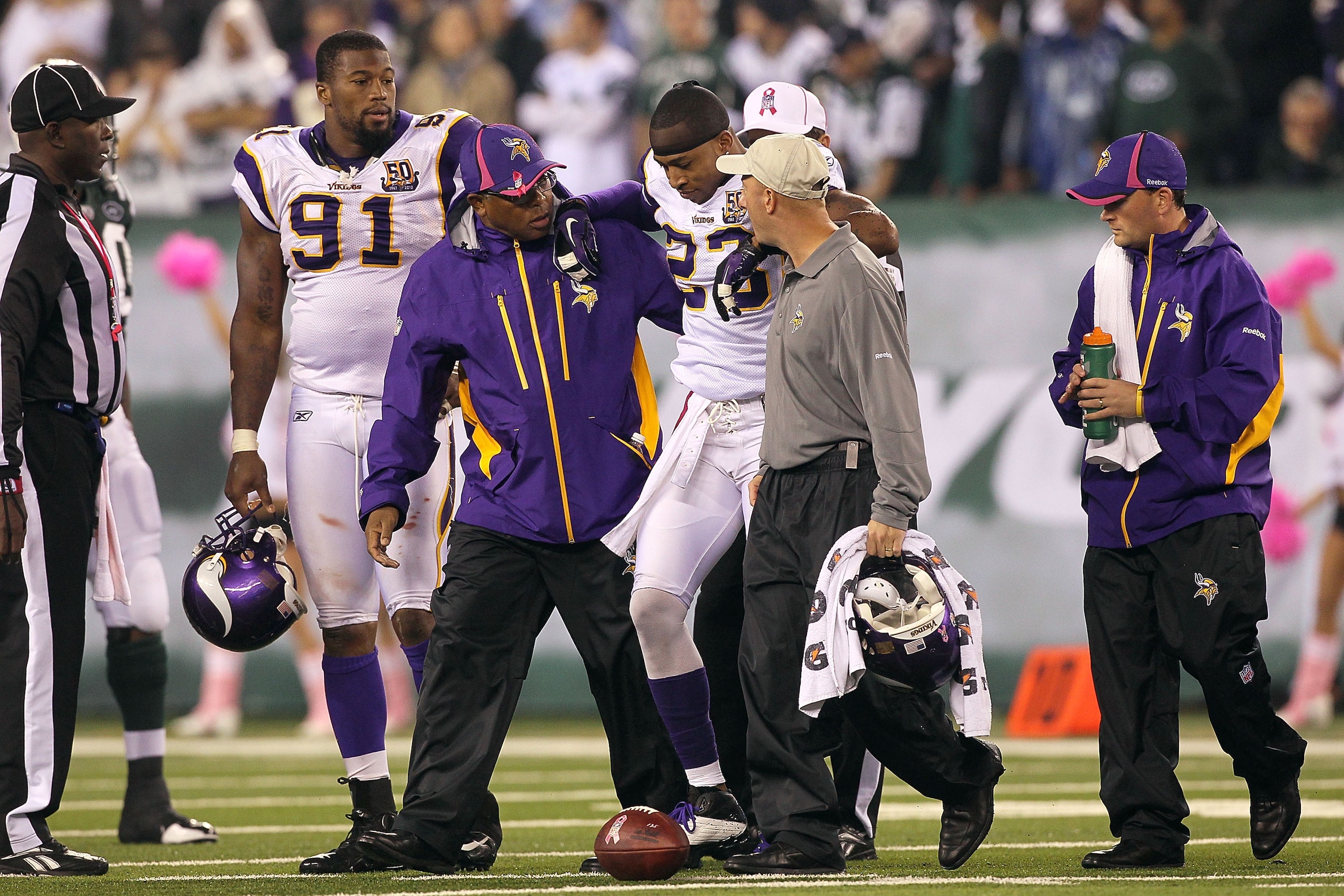 EAST RUTHERFORD, NJ - OCTOBER 11:  Cedric Griffin #23 of the Minnesota Vikings is assisted off the field against the New York Jets at New Meadowlands Stadium on October 11, 2010 in East Rutherford, New Jersey.  (Photo by Jim McIsaac/Getty Images)