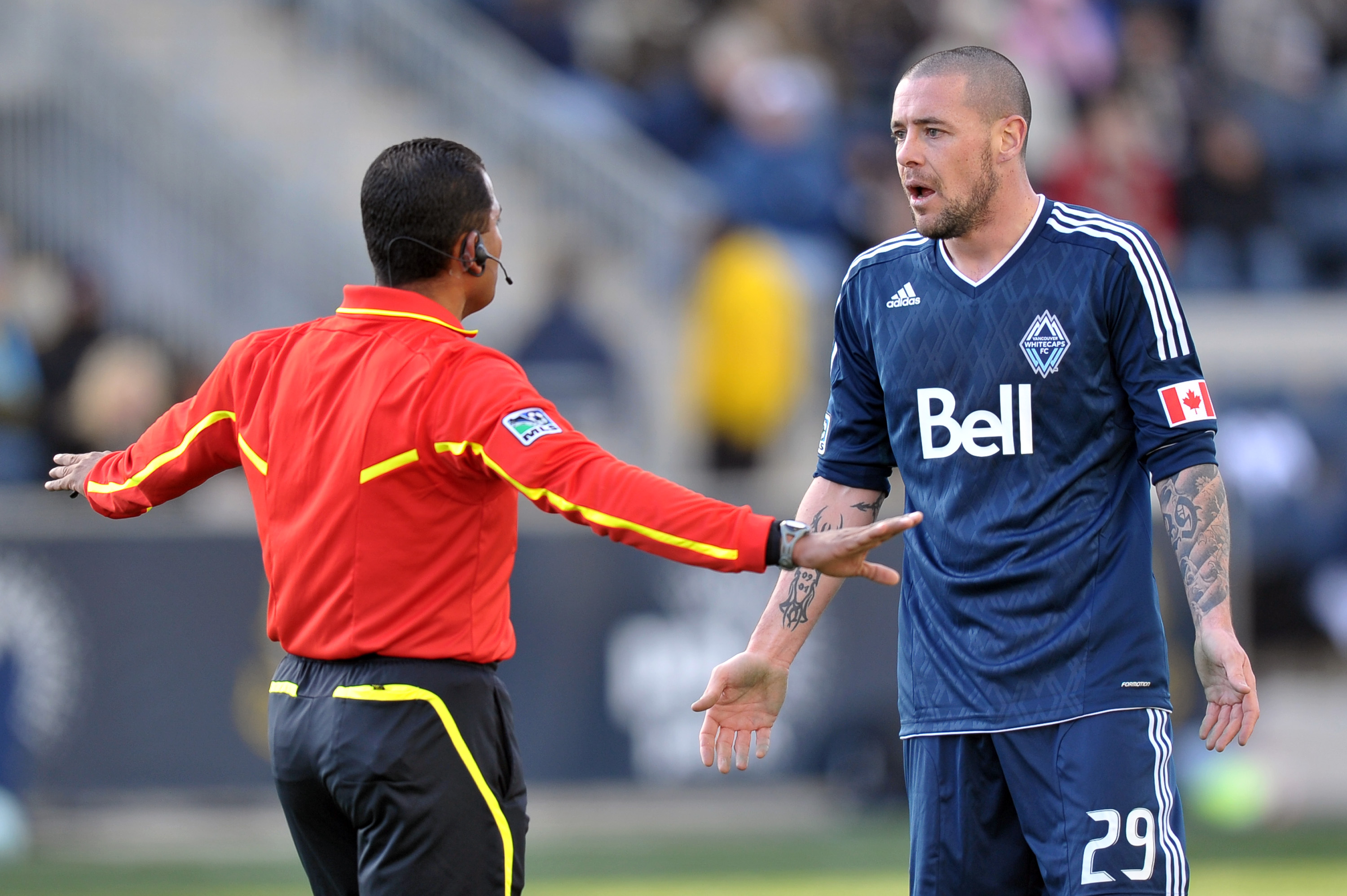 CHESTER, PA- MARCH 26: Eric Hassli #29 of the Vancouver Whitecaps argues with referee Yader Reyes during the game against the Philadelphia Union at PPL Park on March 26, 2011 in Chester, Pennsylvania. (Photo by Drew Hallowell/Getty Images)