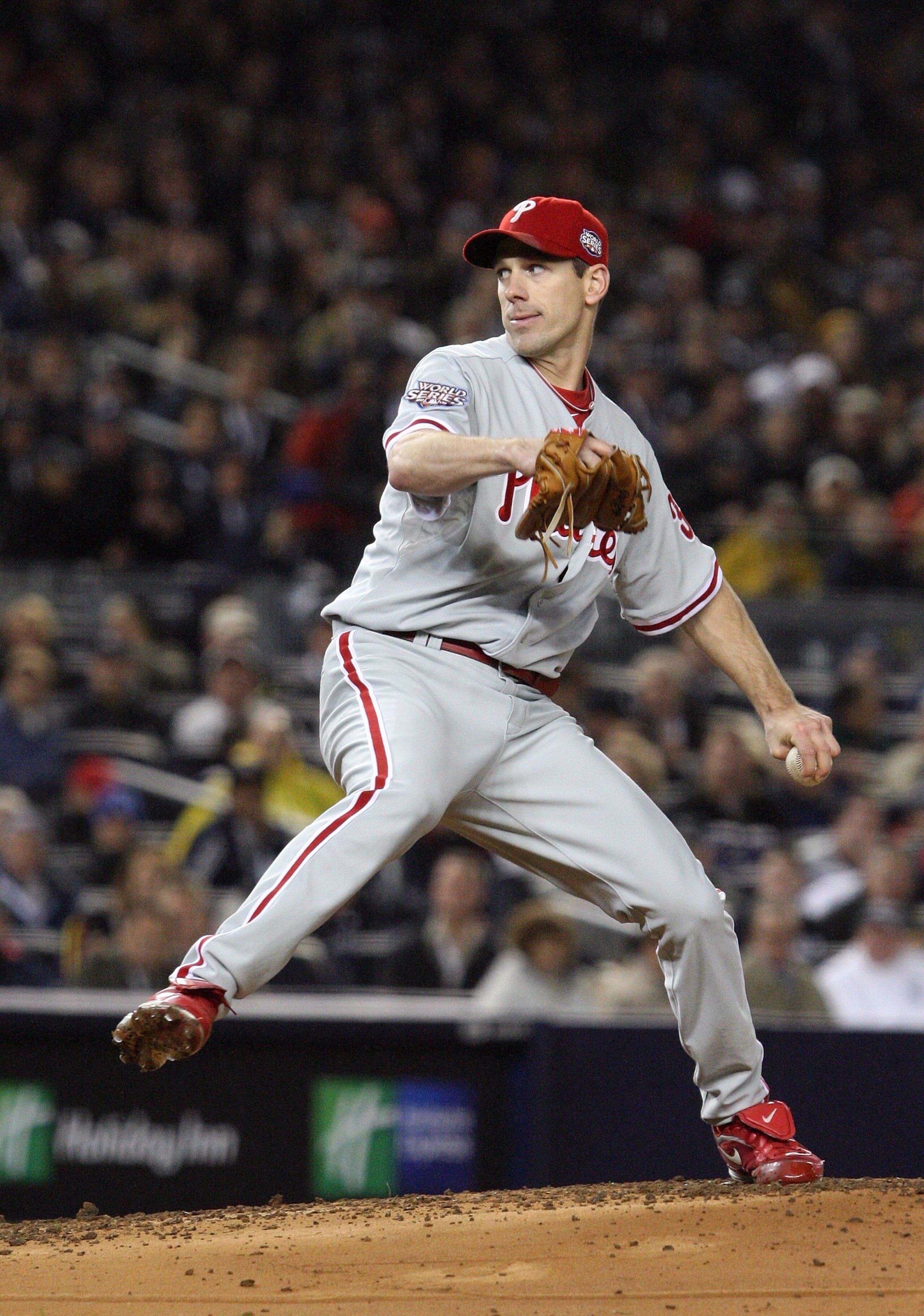 NEW YORK - OCTOBER 28:  Cliff Lee #34 of the Philadelphia Phillies throws a pitch against the New York Yankees in Game One of the 2009 MLB World Series at Yankee Stadium on October 28, 2009 in the Bronx borough of New York City. The Phillies won 6-1.  (Ph