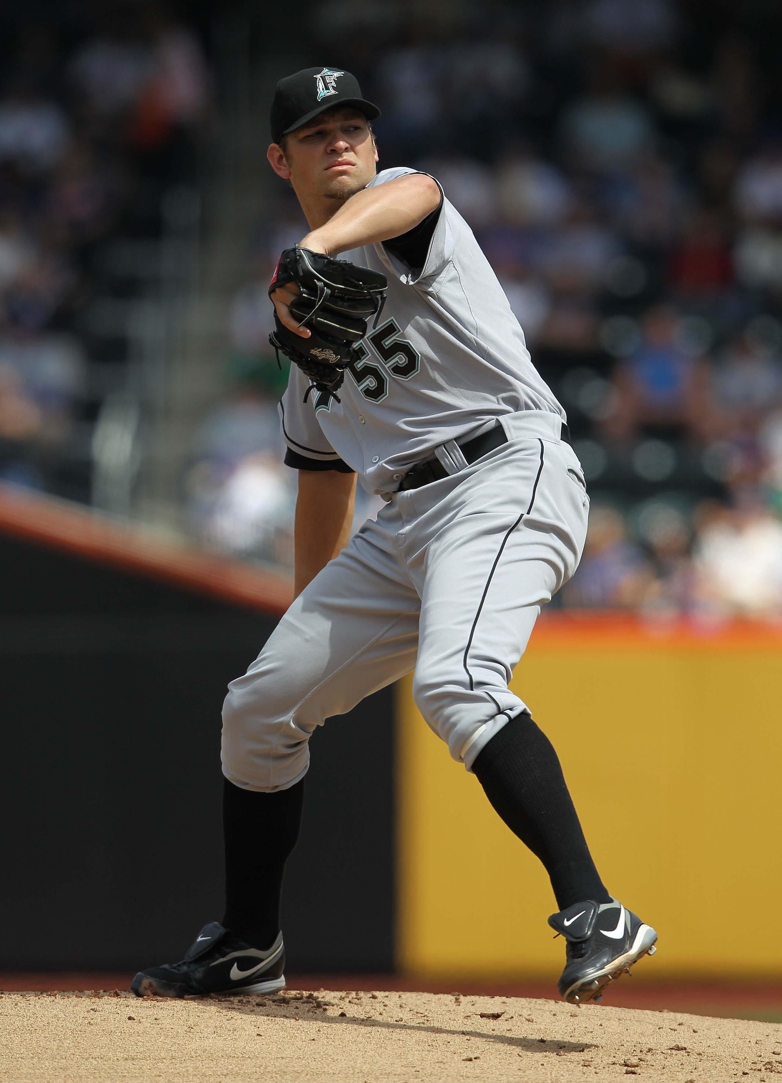 NEW YORK - APRIL 05:  Josh Johnson #55 of the Florida Marlins pitches against the New York Mets during their Opening Day Game at Citi Field on April 5, 2010 in the Flushing neighborhood of the Queens borough of New York City.  (Photo by Nick Laham/Getty I
