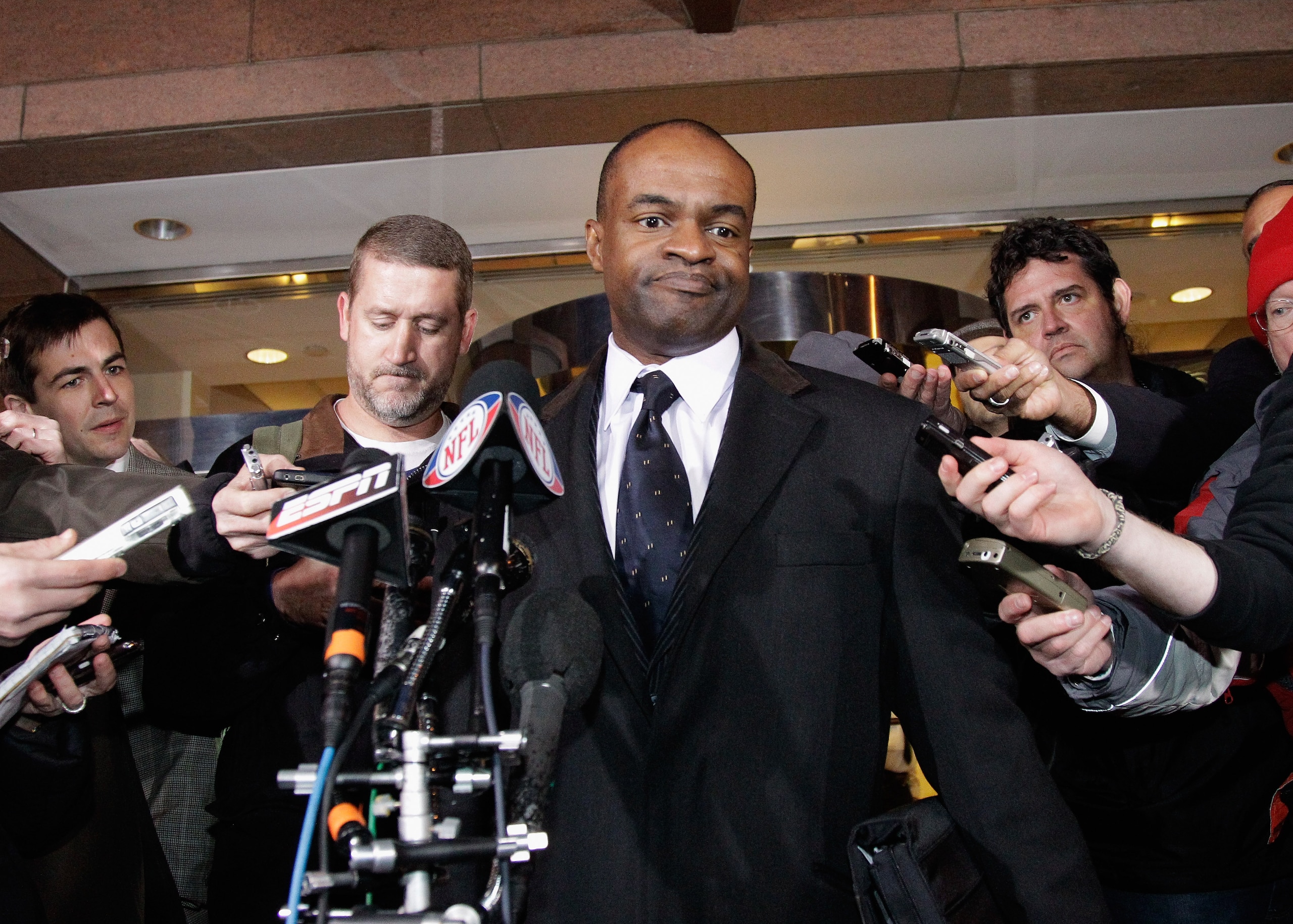 WASHINGTON, DC - MARCH 09:  National Football League Players' Association (NFLPA) executive director DeMaurice Smith talks with the media following meetings at the Federal Mediation and Conciliation Service building for extended labor negotiations March 9