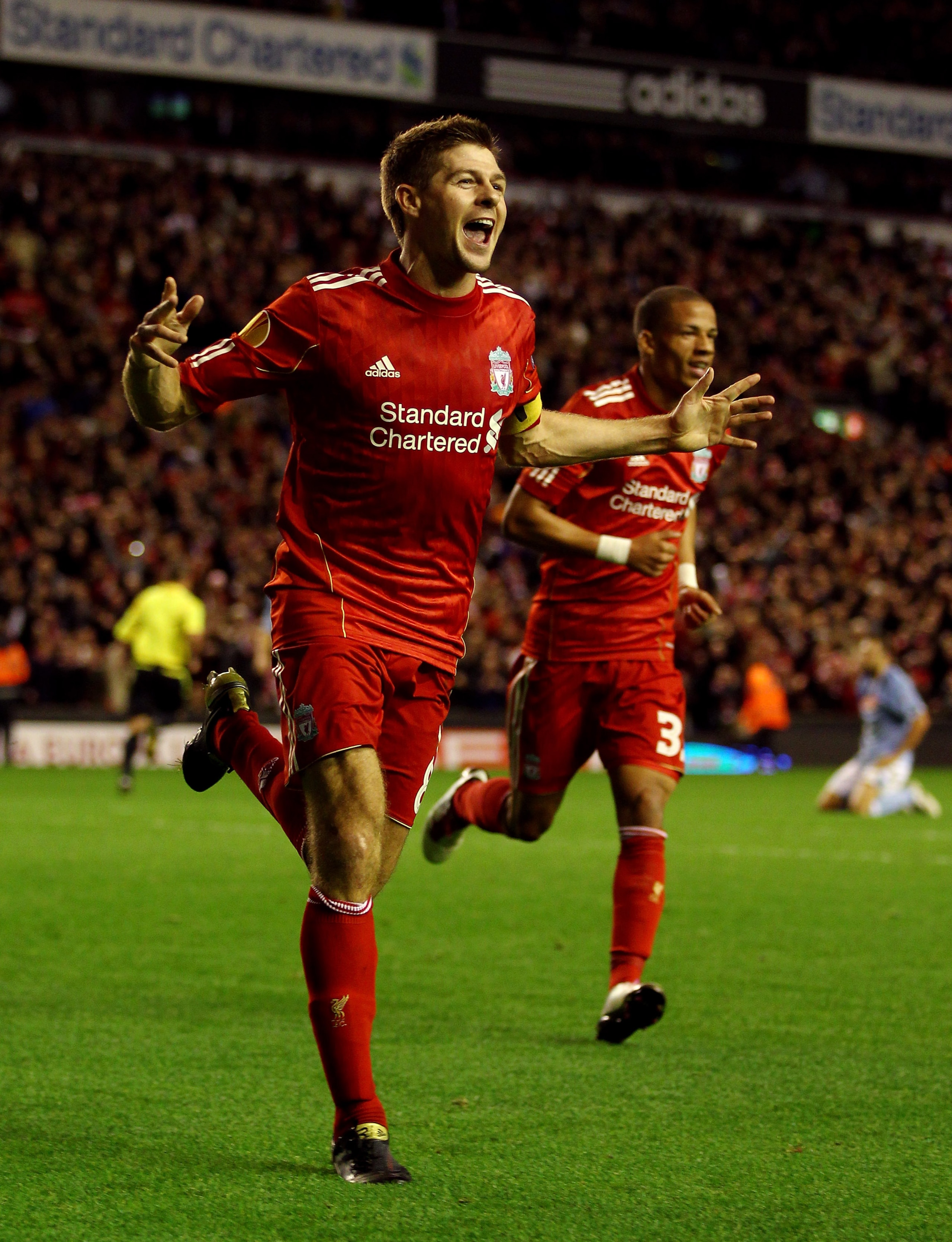 LIVERPOOL, ENGLAND - NOVEMBER 04: Steven Gerrard of Liverpool celebrates scoring his team's third goal and his hat trick during the UEFA Europa League Group K match beteween Liverpool and SSC Napoli at Anfield on November 4, 2010 in Liverpool, England. LIVERPOOL, ENGLAND - NOVEMBER 04: Steven Gerrard of Liverpool celebrates scoring his team's third goal and his hat trick during the UEFA Europa League Group K match beteween Liverpool and SSC Napoli at Anfield on November 4, 2010 in Liverpool, England.