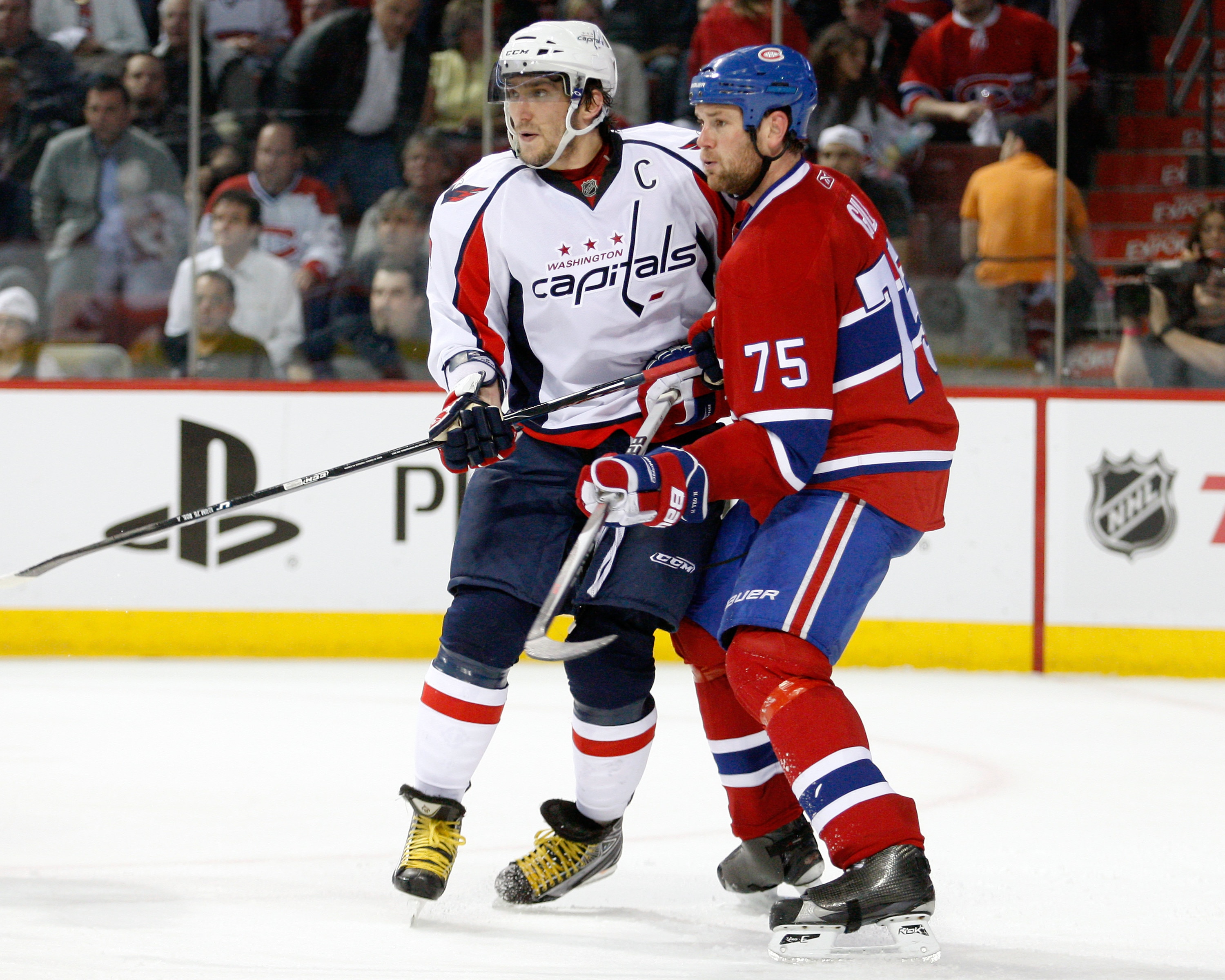 MONTREAL- APRIL 26:  Hal Gill #75 of the Montreal Canadiens defends against Alex Ovechkin #8 of the Washington Capitals in Game Six of the Eastern Conference Quarterfinals during the 2010 NHL Stanley Cup Playoffs at the Bell Centre on April 26, 2010 in Mo