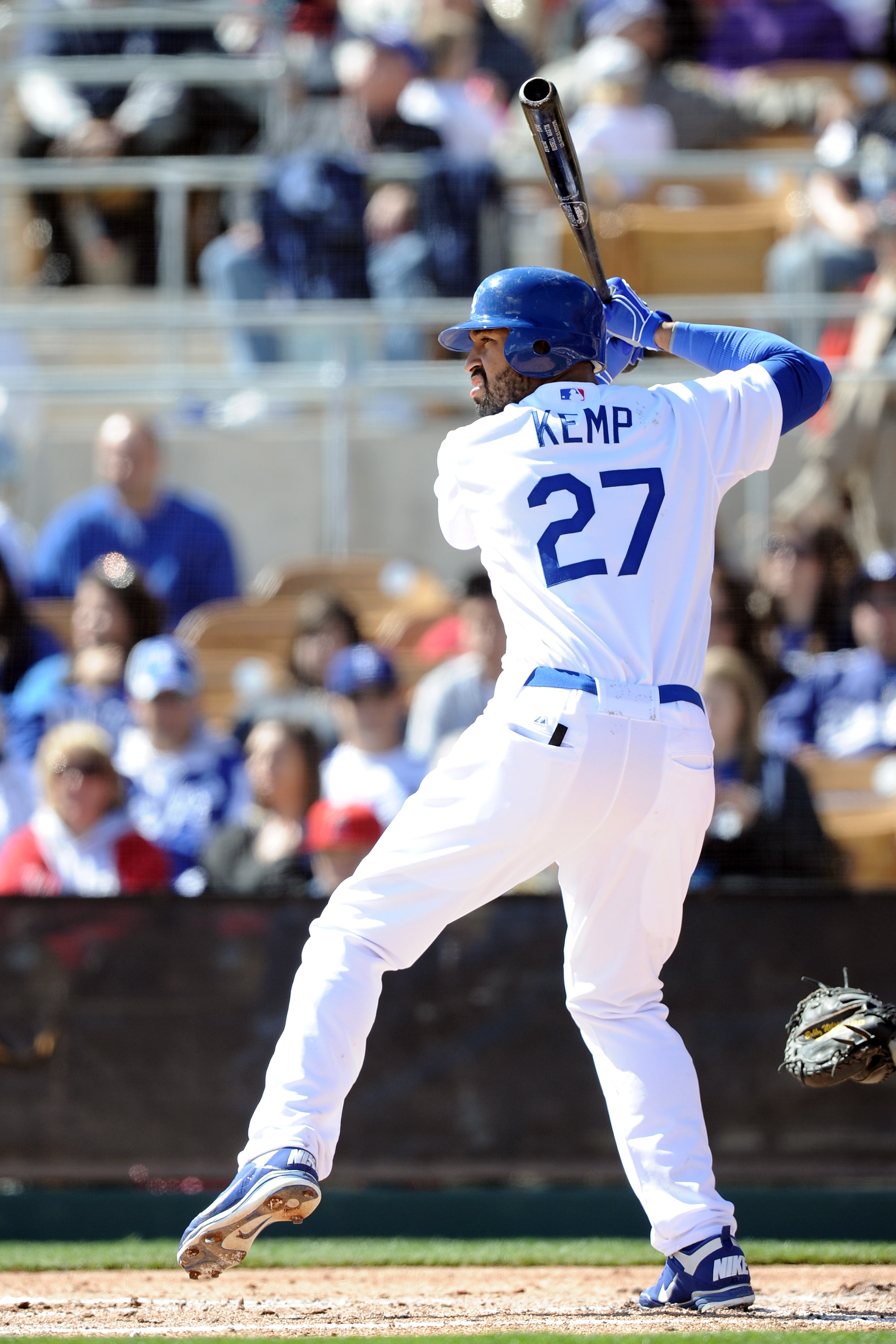 PHOENIX, AZ - FEBRUARY 27:  Matt Kemp #27 of the  Los Angeles Dodgers at bat during spring training at Camelback Ranch on February 27, 2011 in Phoenix, Arizona.  (Photo by Harry How/Getty Images)