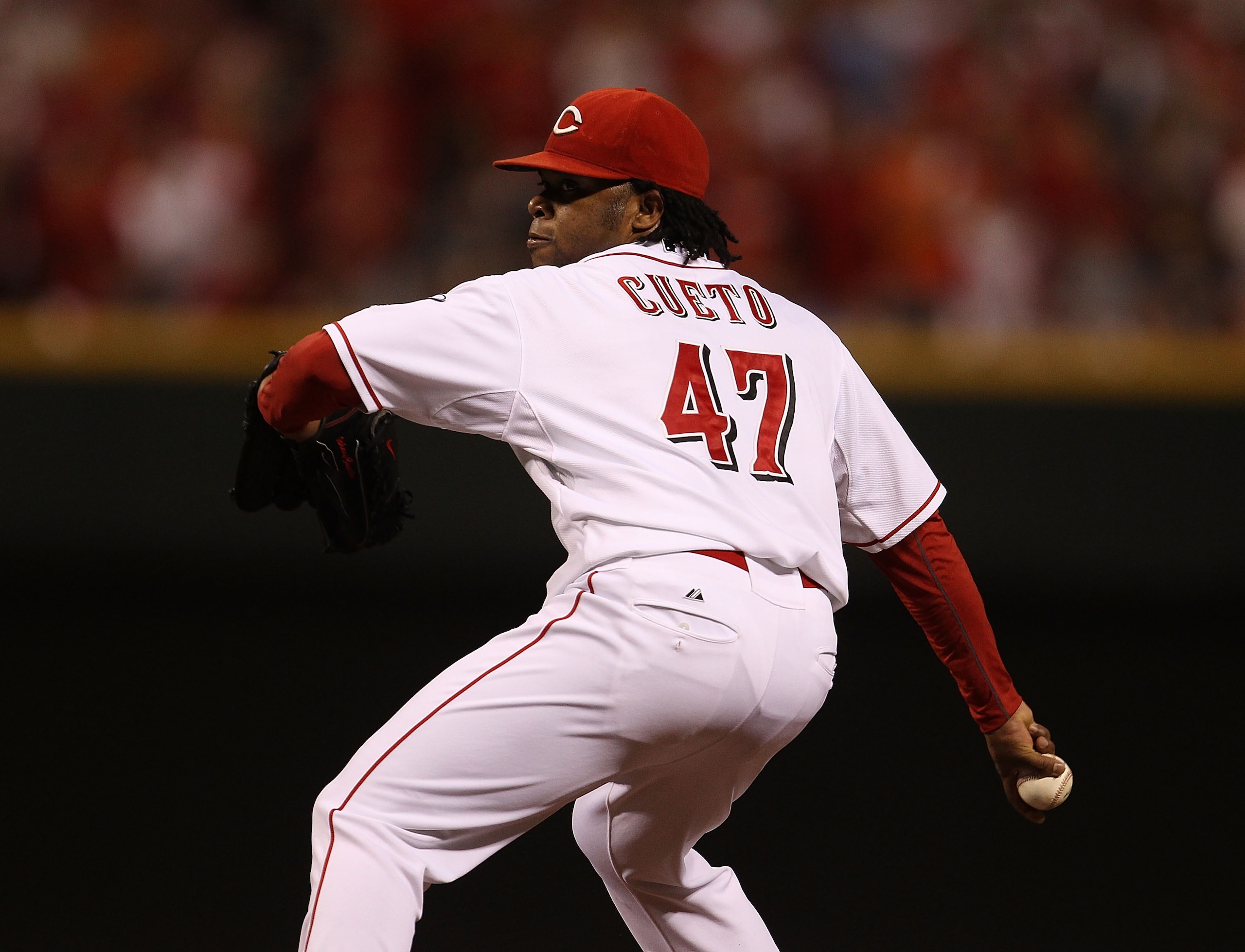 CINCINNATI - OCTOBER 10: Starting pitcher Johnny Cueto #47 of the Cincinnati Reds delivers the ball against the Philadelphia Phillies during game 3 of the NLDS at Great American Ball Park on October 10, 2010 in Cincinnati, Ohio. The Phillies defeated the