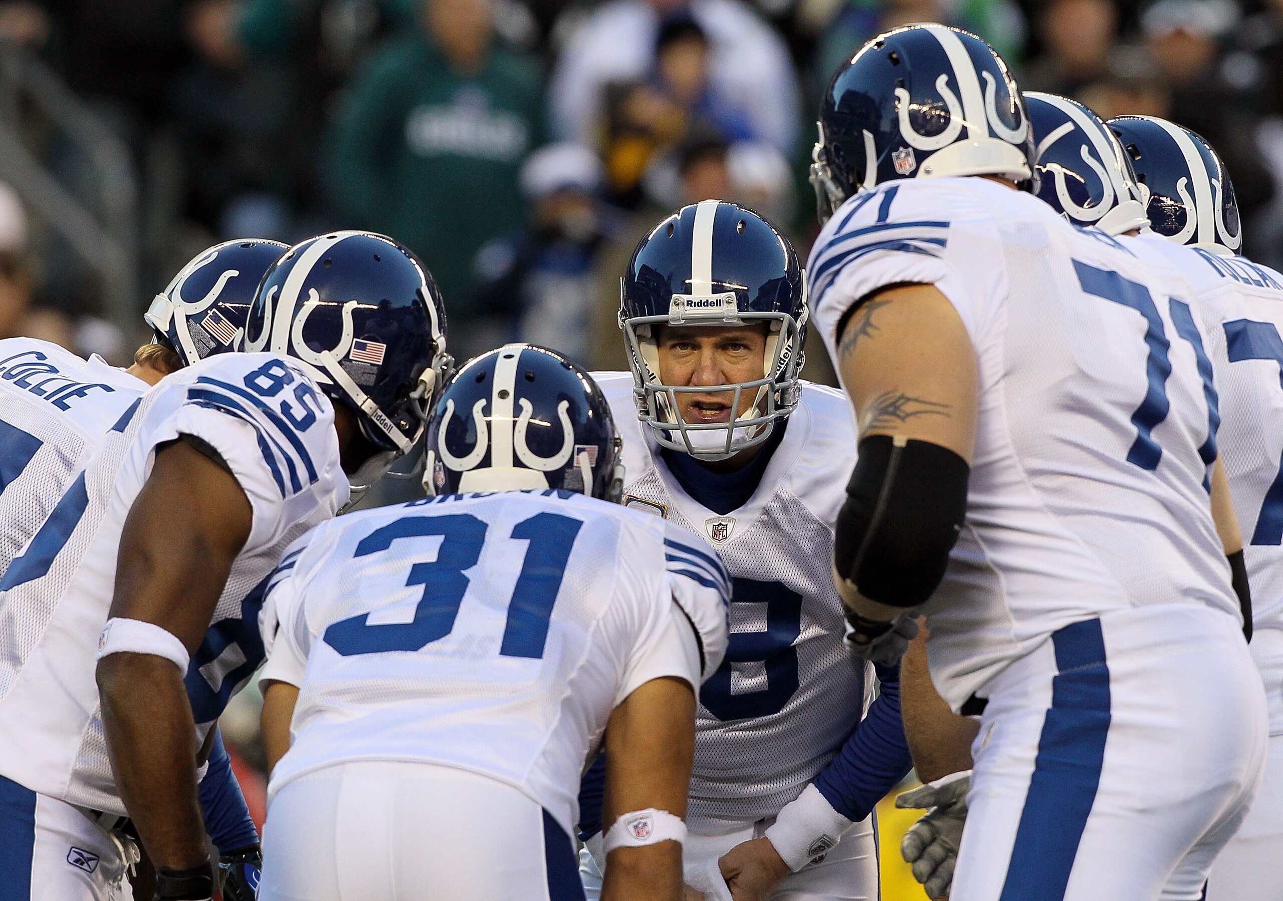 PHILADELPHIA - NOVEMBER 07:  Peyton Manning #18 of the Indianapolis Colts huddles with his team against the Philadelphia Eagles on November 7, 2010 at Lincoln Financial Field in Philadelphia, Pennsylvania.  (Photo by Jim McIsaac/Getty Images)