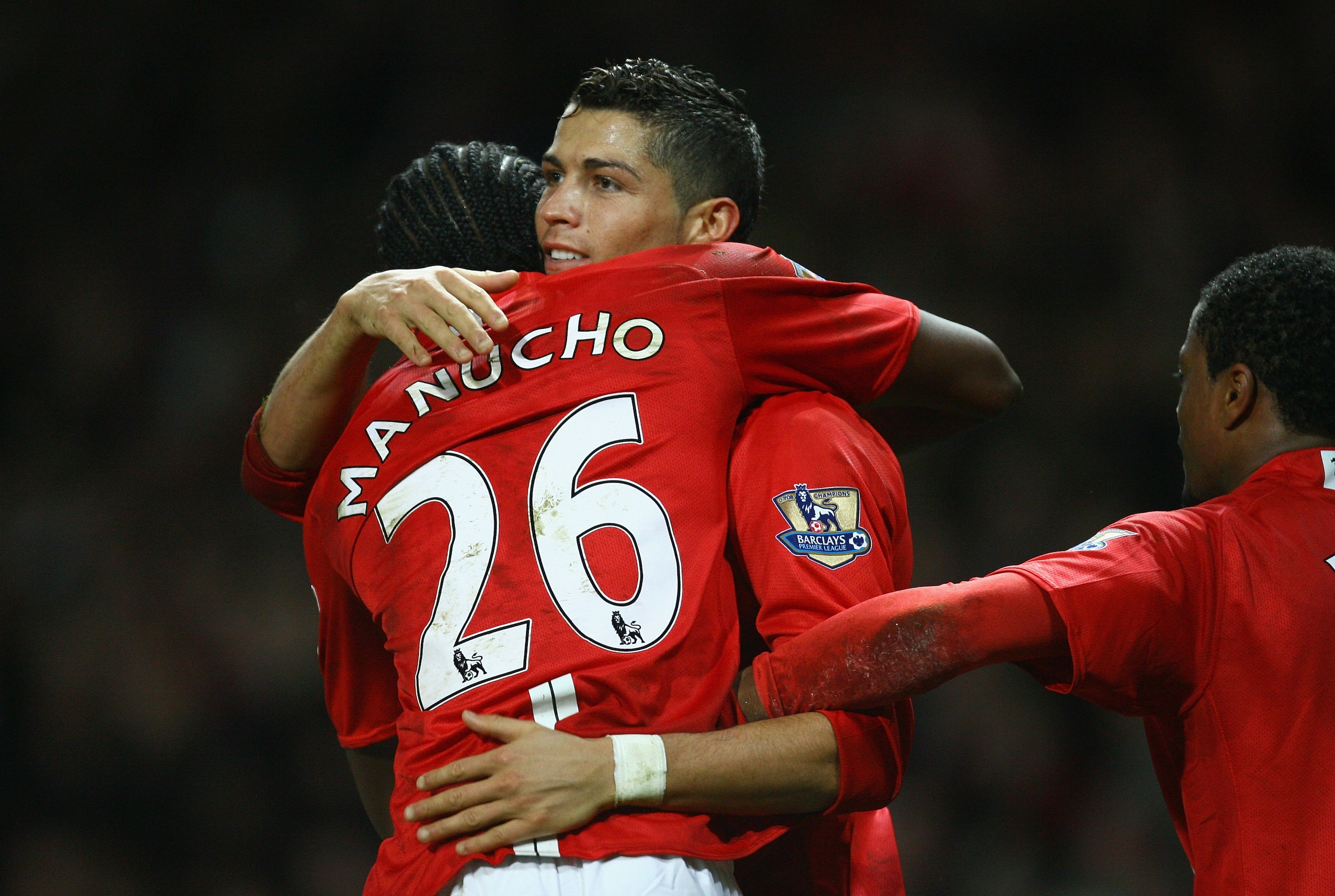 MANCHESTER, UNITED KINGDOM - NOVEMBER 15: Cristiano Ronaldo of Manchester United celebrates scoring his team's fifth goal with team mate Manucho during the Barclays Premier League match between Manchester United and Stoke City at Old Trafford on Novembe MANCHESTER, UNITED KINGDOM - NOVEMBER 15: Cristiano Ronaldo of Manchester United celebrates scoring his team's fifth goal with team mate Manucho during the Barclays Premier League match between Manchester United and Stoke City at Old Trafford on Novembe