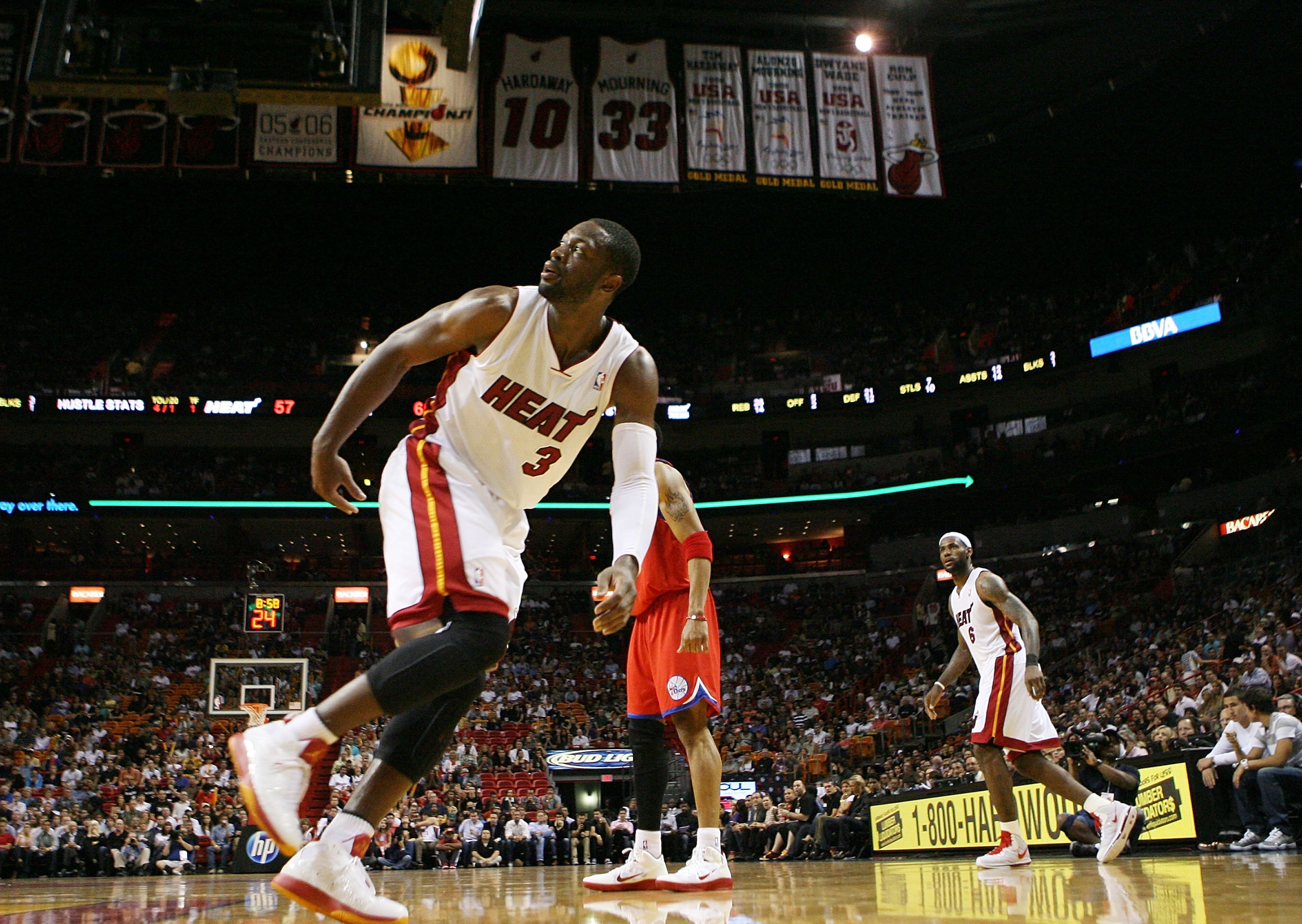 MIAMI, FL - MARCH 25:  Guard Dwyane Wade #3 of the Miami Heat reacts during a game againts the Philadelphia Sixers at American Airlines Arena on March 25, 2011 in Miami, Florida. NOTE TO USER: User expressly acknowledges and agrees that, by downloading an