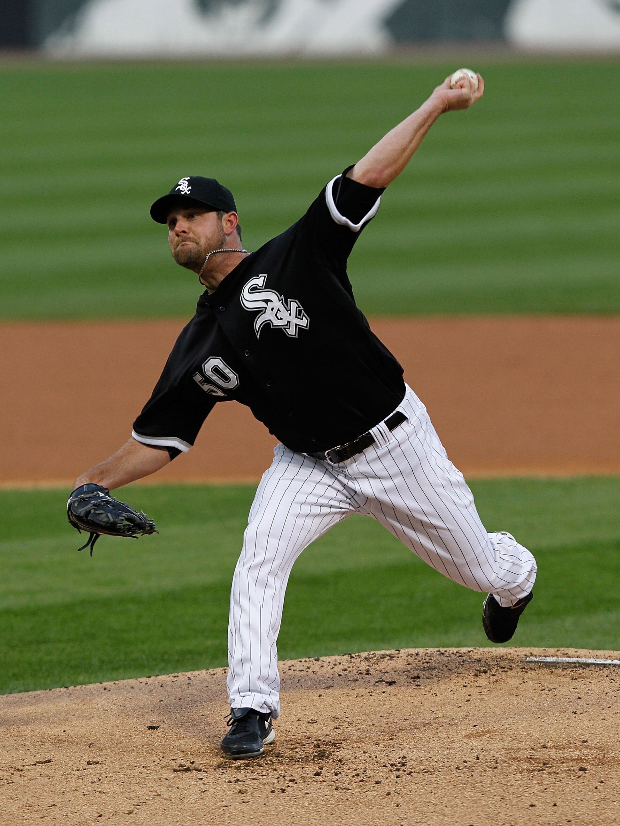 CHICAGO - MAY 06: Starting pitcher John Danks #50 of the Chicago White Sox delivers the ball against the Toronto Blue Jays at U.S. Cellular Field on May 6, 2010 in Chicago, Illinois. (Photo by Jonathan Daniel/Getty Images)