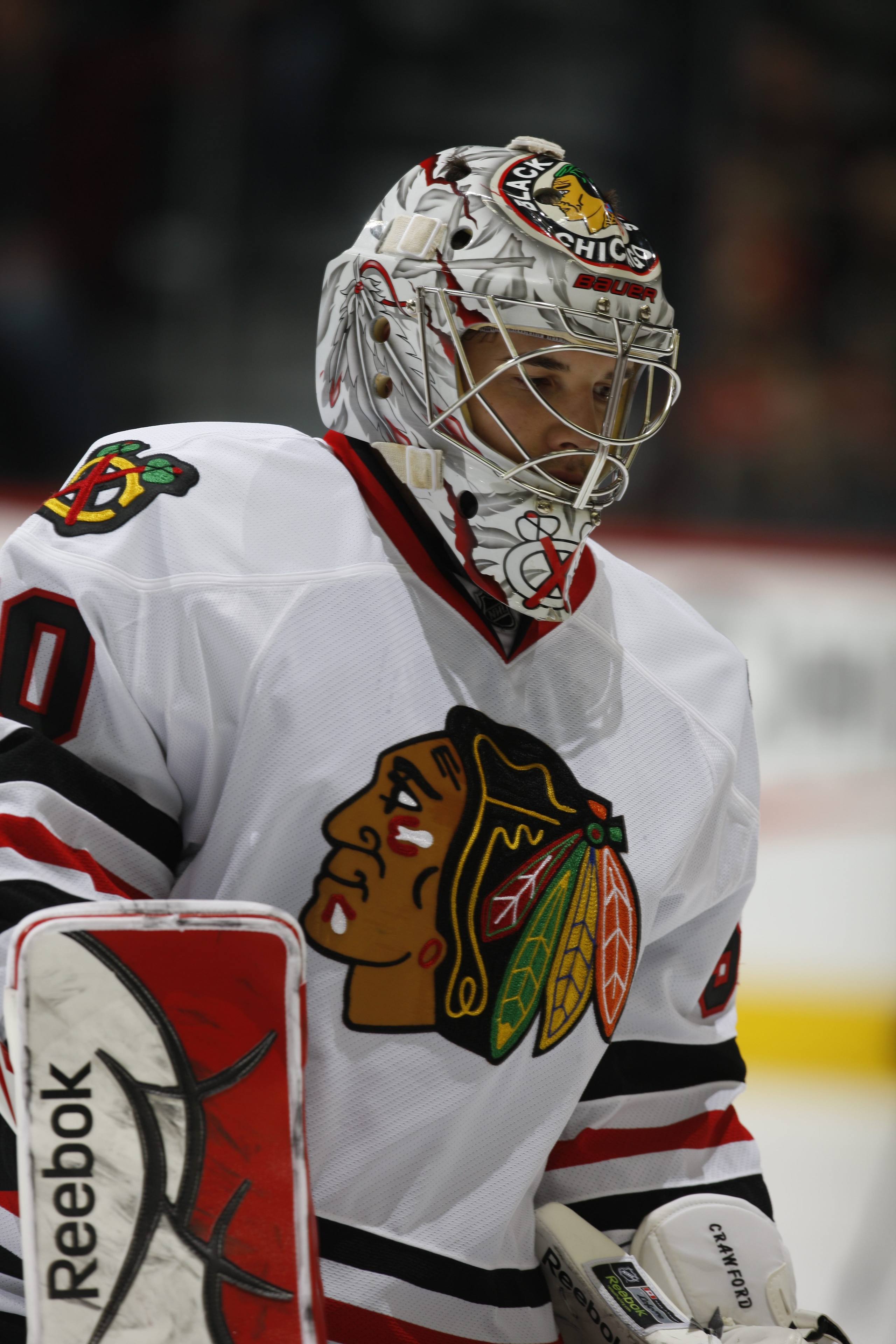 CALGARY, CANADA - FEBRUARY 7: Corey Crawford #50 of the Chicago Blackhawks protects the goal against the Calgary Flames on February 7, 2011 at Scotiabank Saddledome in Calgary, Alberta, Canada. (Photo by Dale MacMillan/Getty Images)