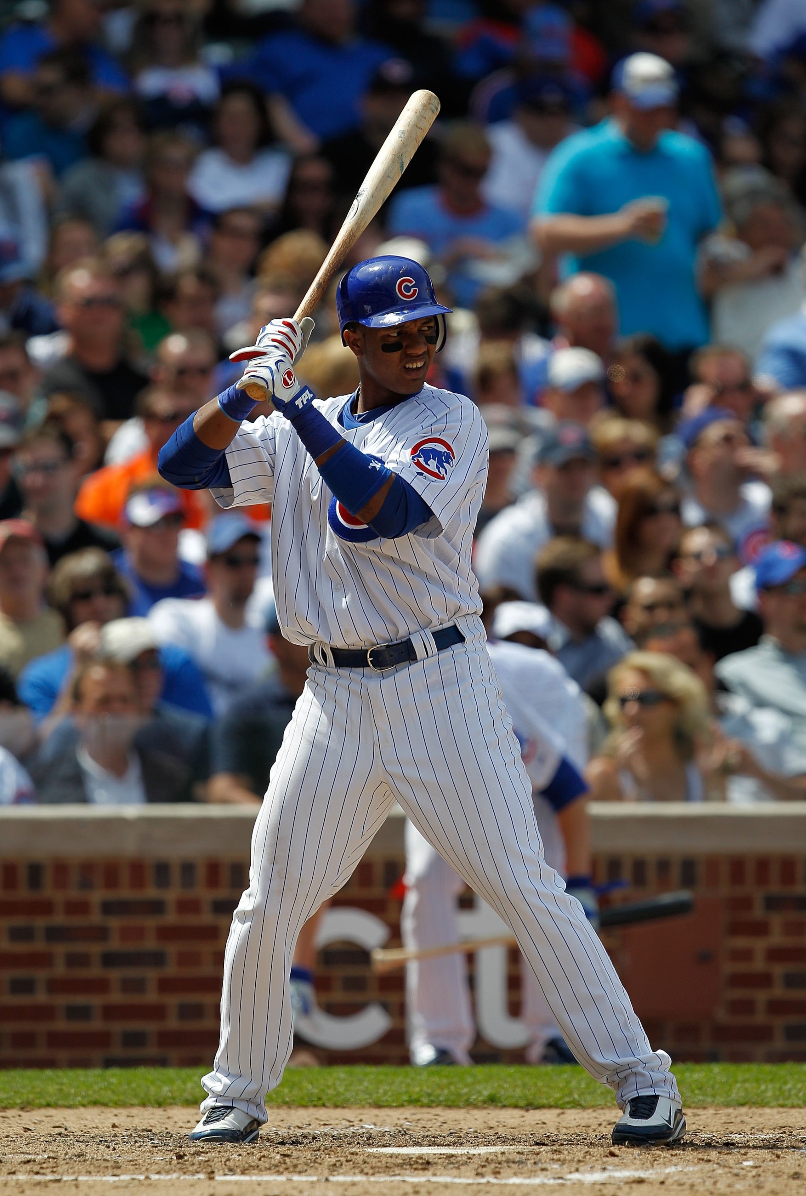 CHICAGO - MAY 14: Starlin Castro #13 of the Chicago Cubs prepares to hit against the Pittsburgh Pirates at Wrigley Field on May 14, 2010 in Chicago, Illinois. The Pirates defeated the Cubs 10-6. (Photo by Jonathan Daniel/Getty Images)