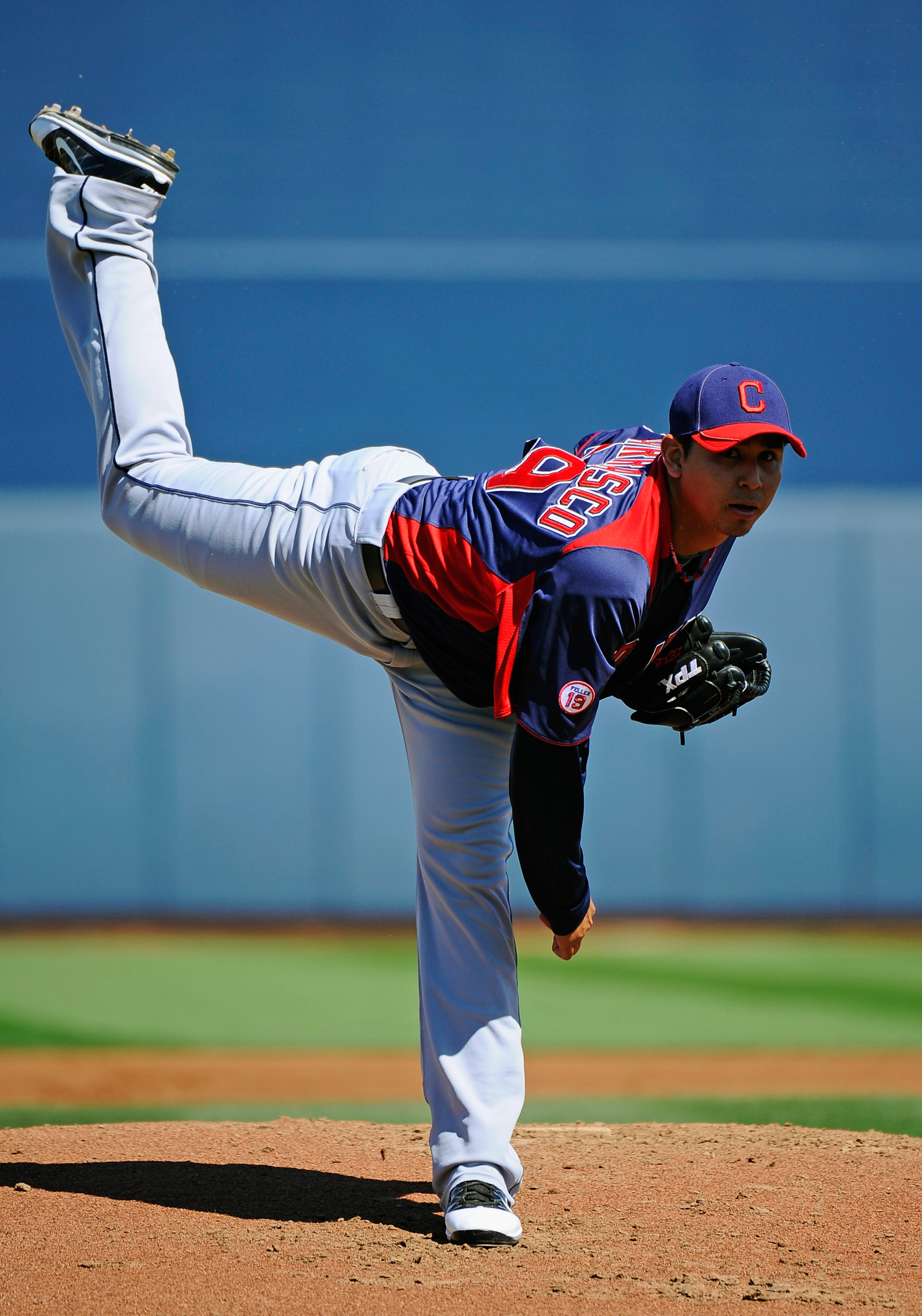 PEORIA, AZ - MARCH 13:  Pitcher Carlos Carrasco #59 of the Cleveland Indians throws a pitch against the San Diego Padres during the spring training baseball game at Peoria Stadium on March 13, 2011 in Peoria, Arizona.  (Photo by Kevork Djansezian/Getty Im