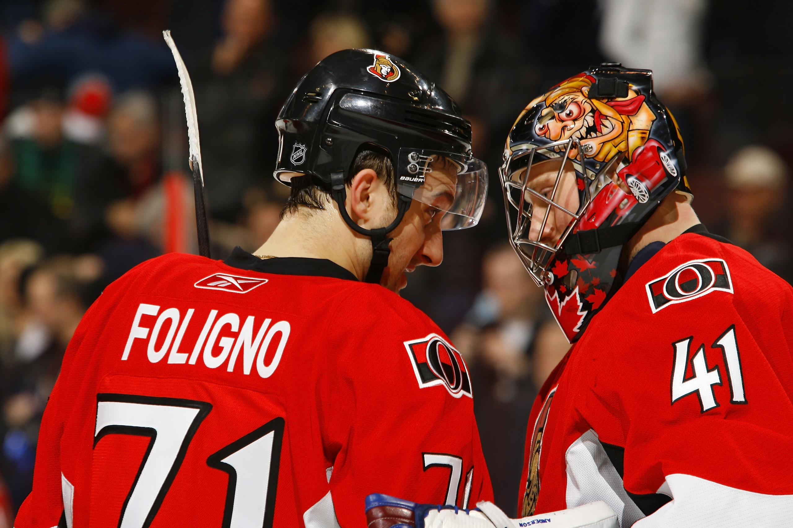 OTTAWA, CANADA - MARCH 25:  Nick Foligno #71 of the Ottawa Senators congratulates teammate Craig Anderson #41 on his shutout victory over the Washington Capitals in a game at Scotiabank Place on March 25, 2011 in Ottawa, Canada.  (Photo by Phillip MacCall