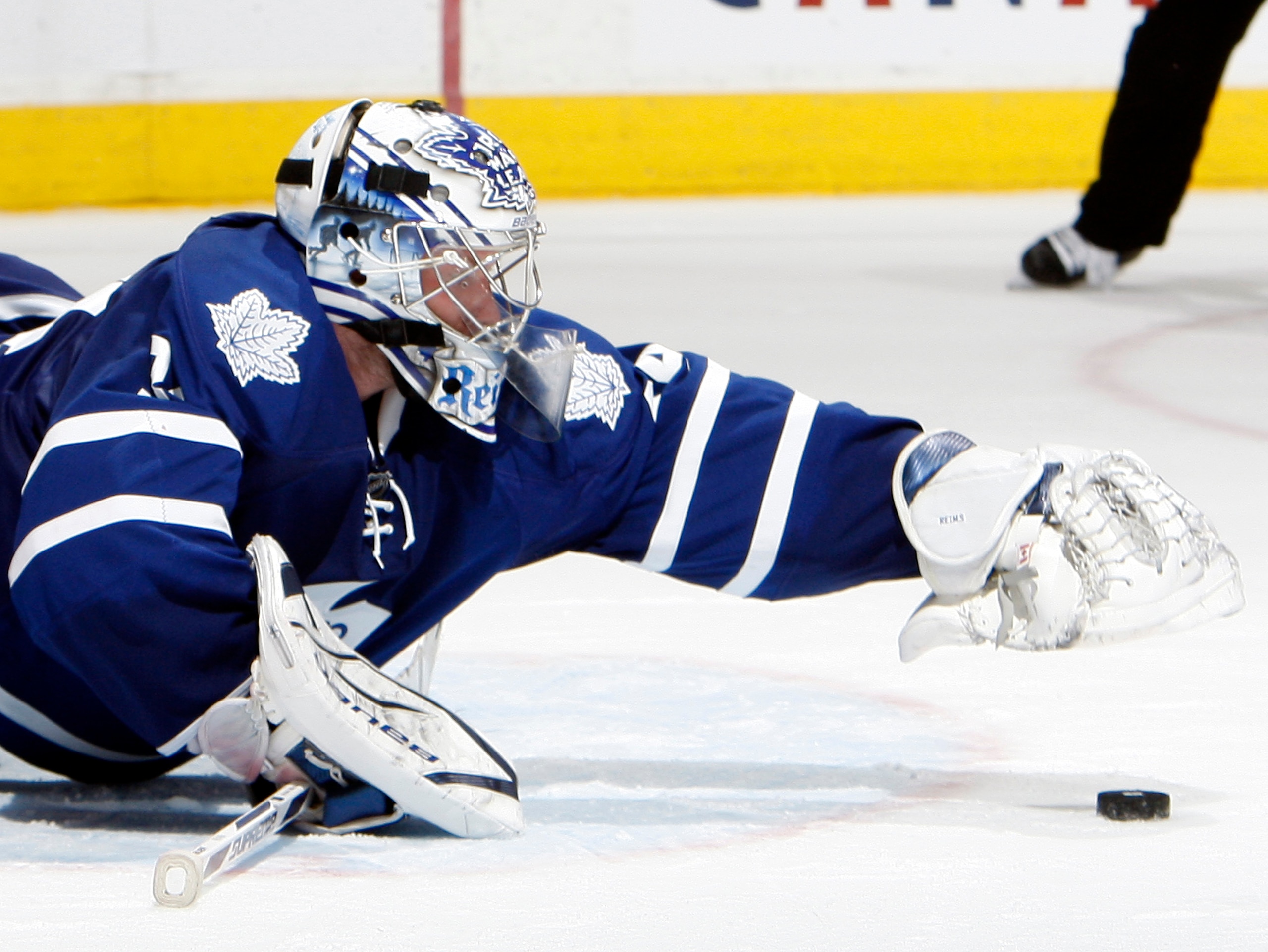 TORONTO, CANADA - FEBRUARY 26: James Reimer #34 of the Toronto Maple Leafs jumps on a rebound against the Pittsburgh Penguins during game action at the Air Canada Centre February 26, 2011 in Toronto, Ontario, Canada. (Photo by Abelimages/Getty Images)
