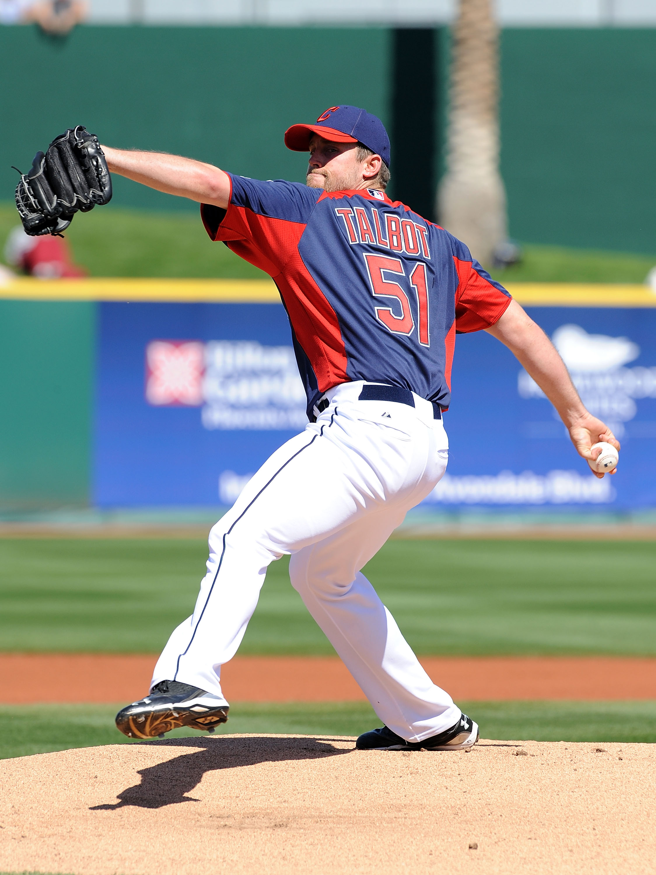 GOODYEAR, AZ - MARCH 11:  Mitch Talbot #51 of the Cleveland Indians delivers a pitch against the Seattle Mariners at Goodyear Ballpark on March 11, 2011 in Goodyear, Arizona.  (Photo by Norm Hall/Getty Images)
