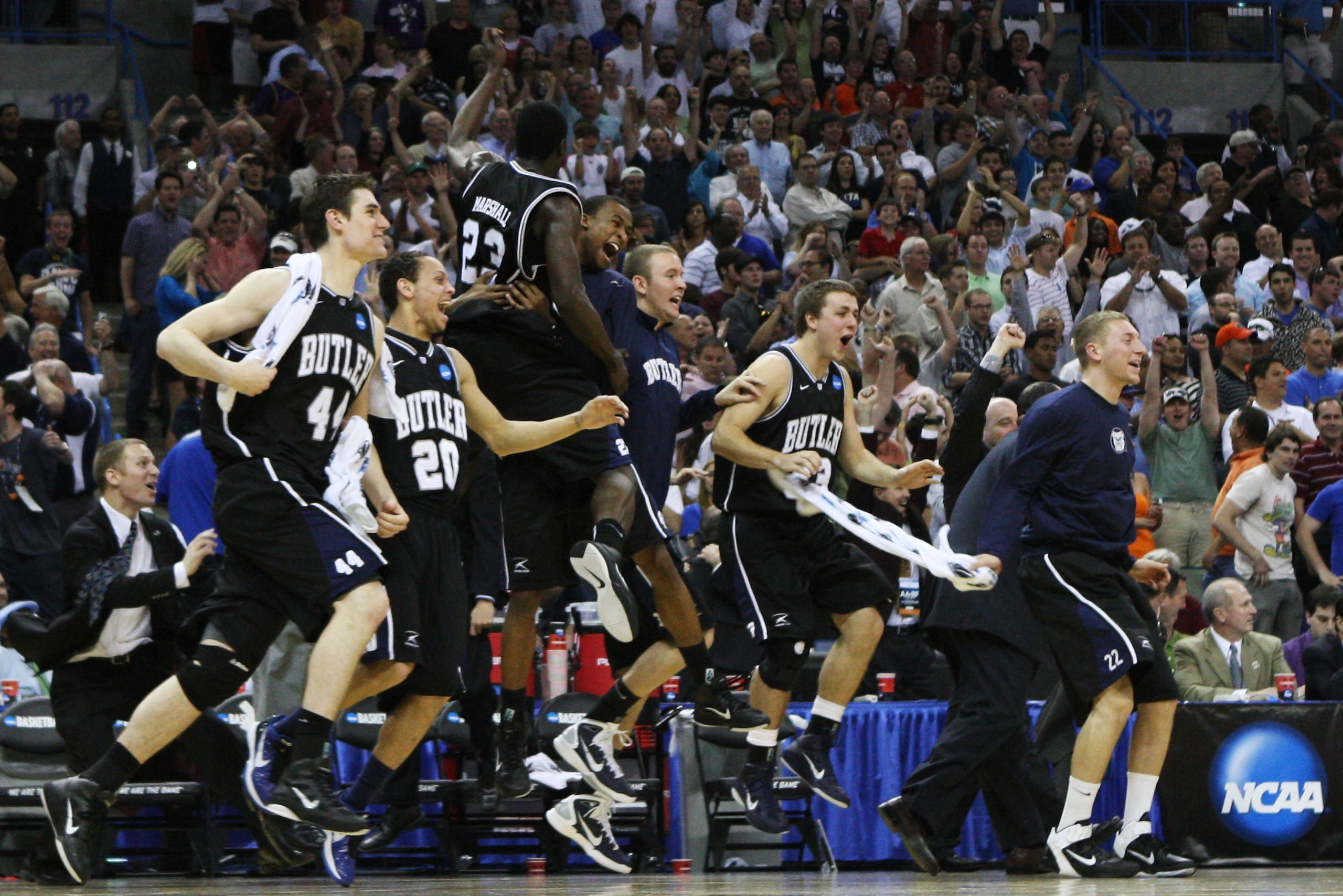 NEW ORLEANS, LA - MARCH 26:  The Butler Bulldogs celebrate after defeating the Florida Gators 74 to 71 in overtime during the Southeast regional final of the 2011 NCAA men's basketball tournament at New Orleans Arena on March 26, 2011 in New Orleans, Loui