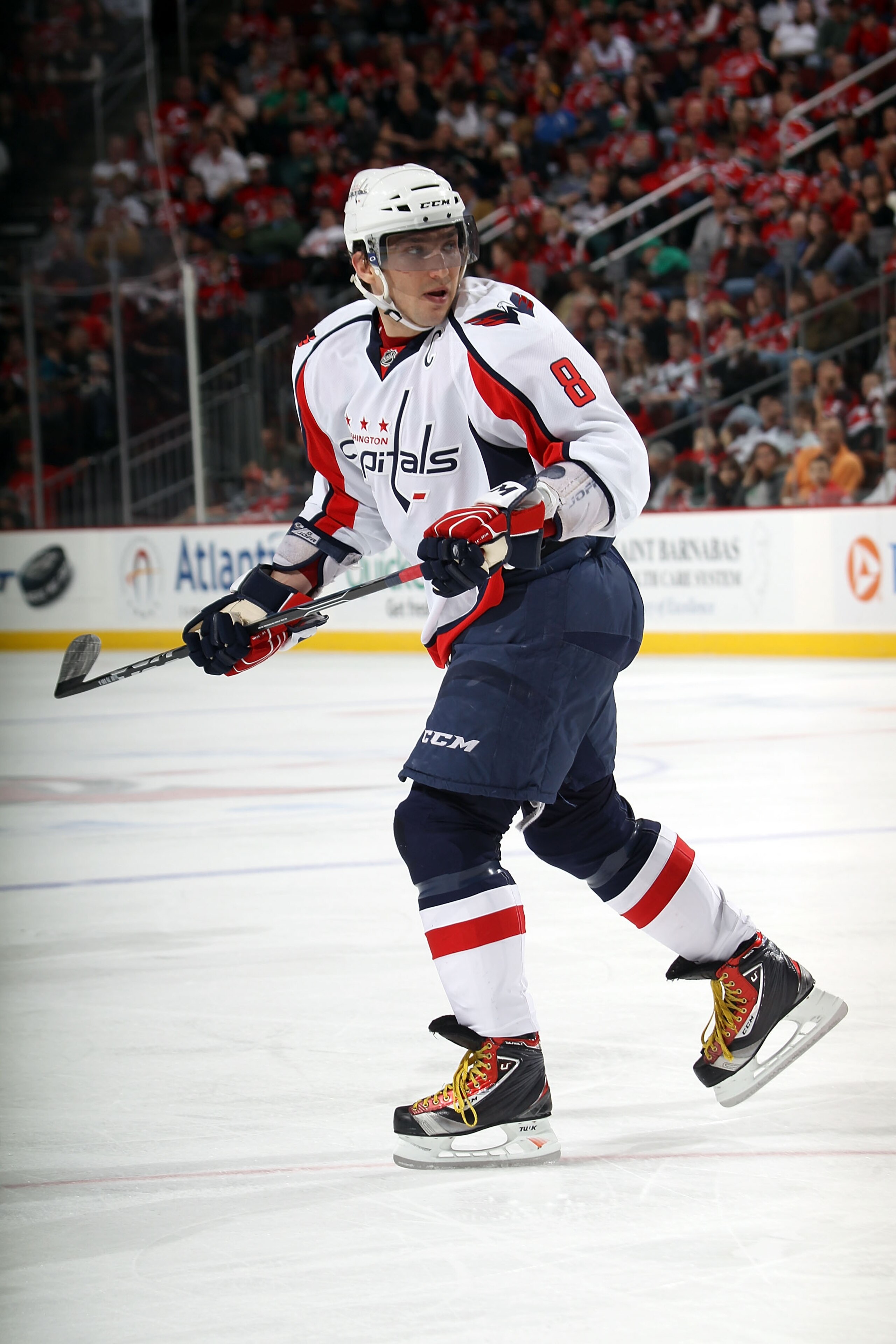 NEWARK, NJ - MARCH 18:  Alex Ovechkin #8 of the Washington Capitals skates against the New Jersey Devils at the Prudential Center on March 18, 2011 in Newark, New Jersey. The Capitals shut out the Devils 3-0.  (Photo by Bruce Bennett/Getty Images)