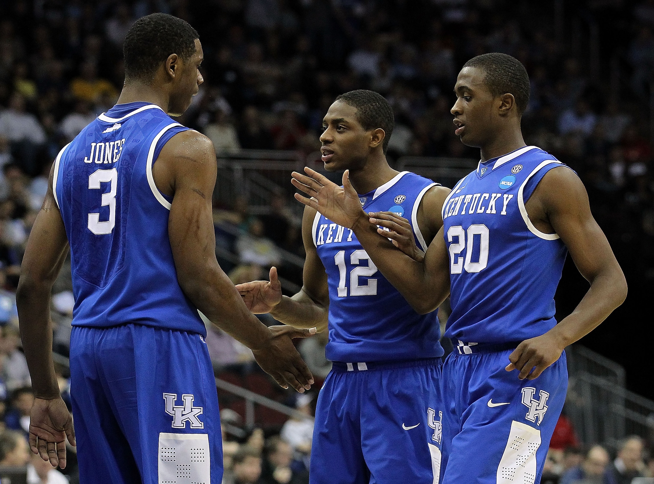 NEWARK, NJ - MARCH 27:  Terrence Jones #3 of the Kentucky Wildcats is congratulated by Brandon Knight #12 and Doron Lamb #20 during the first half of the game against the North Carolina Tar Heels in the east regional final of the 2011 NCAA men's basketbal