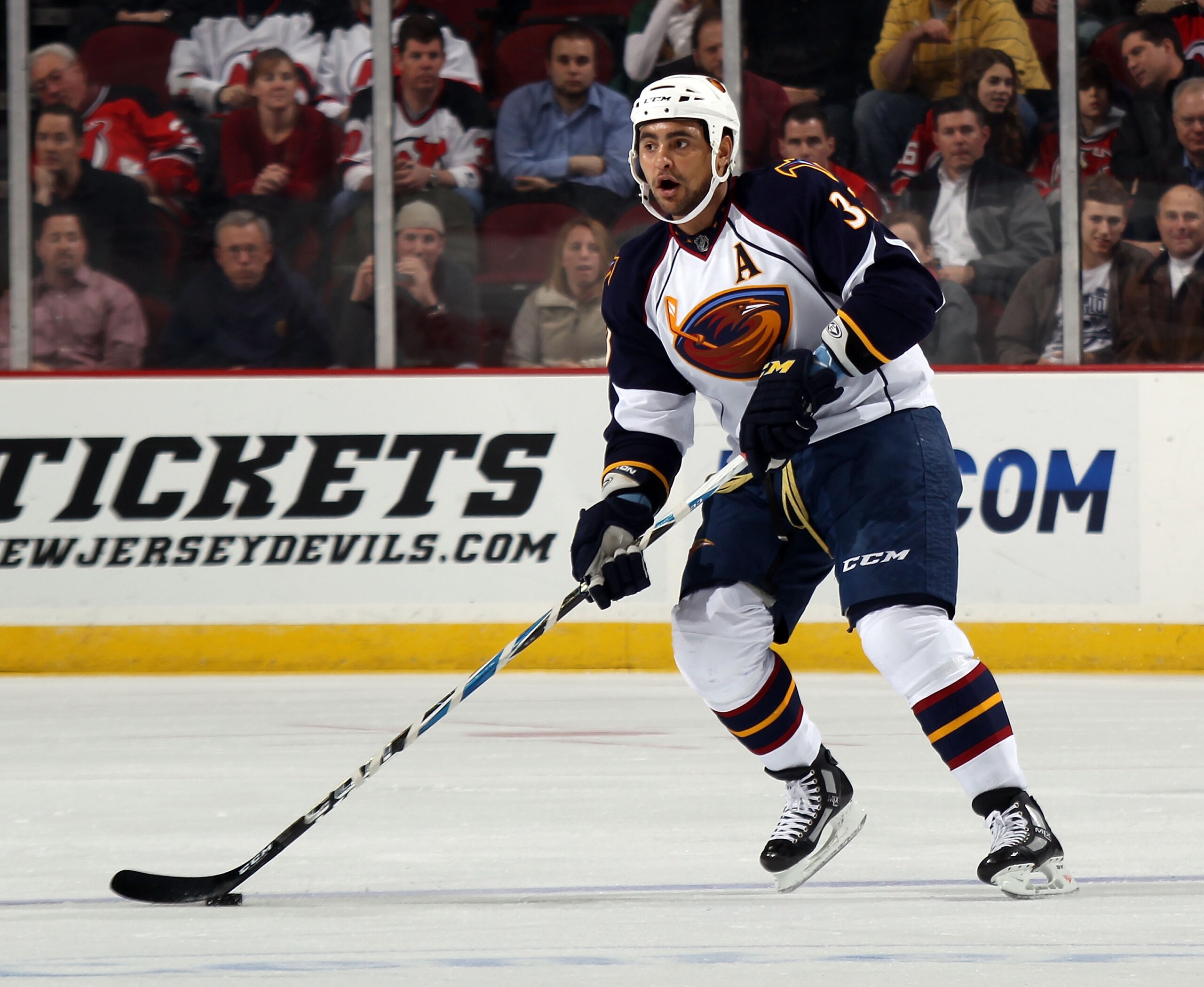 NEWARK, NJ - MARCH 15:  Dustin Byfuglien #33 of the Atlanta Thrashers skates against the New Jersey Devils at the Prudential Center on March 15, 2011 in Newark, New Jersey. The Devils defeated the Thrashers 4-2.  (Photo by Bruce Bennett/Getty Images)