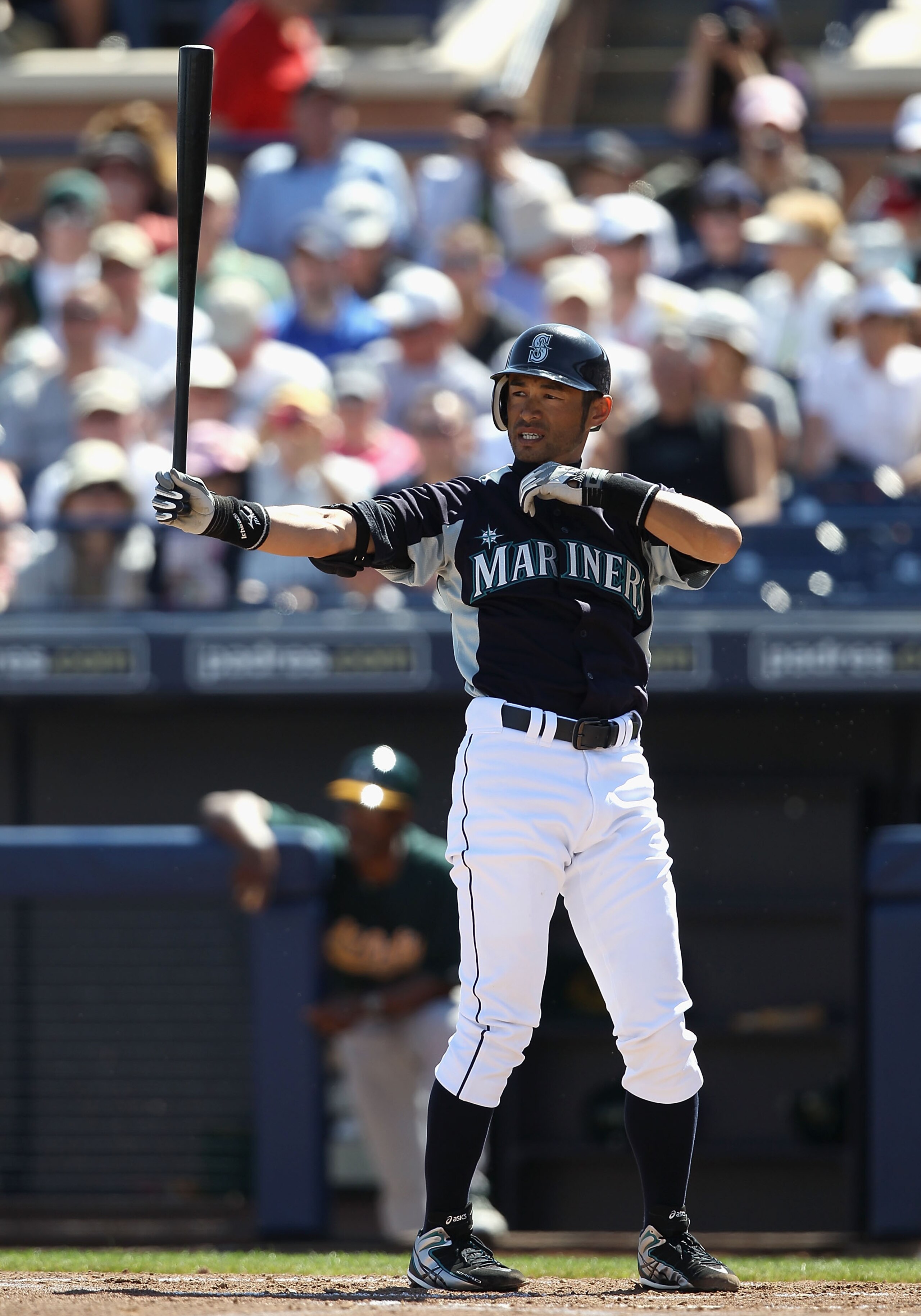 PEORIA, AZ - MARCH 12:  Ichiro Suzuki #51 of the Seattle Mariners bats against the Oakland Athletics during the spring training game at Peoria Stadium on March 12, 2011 in Peoria, Arizona.  (Photo by Christian Petersen/Getty Images)