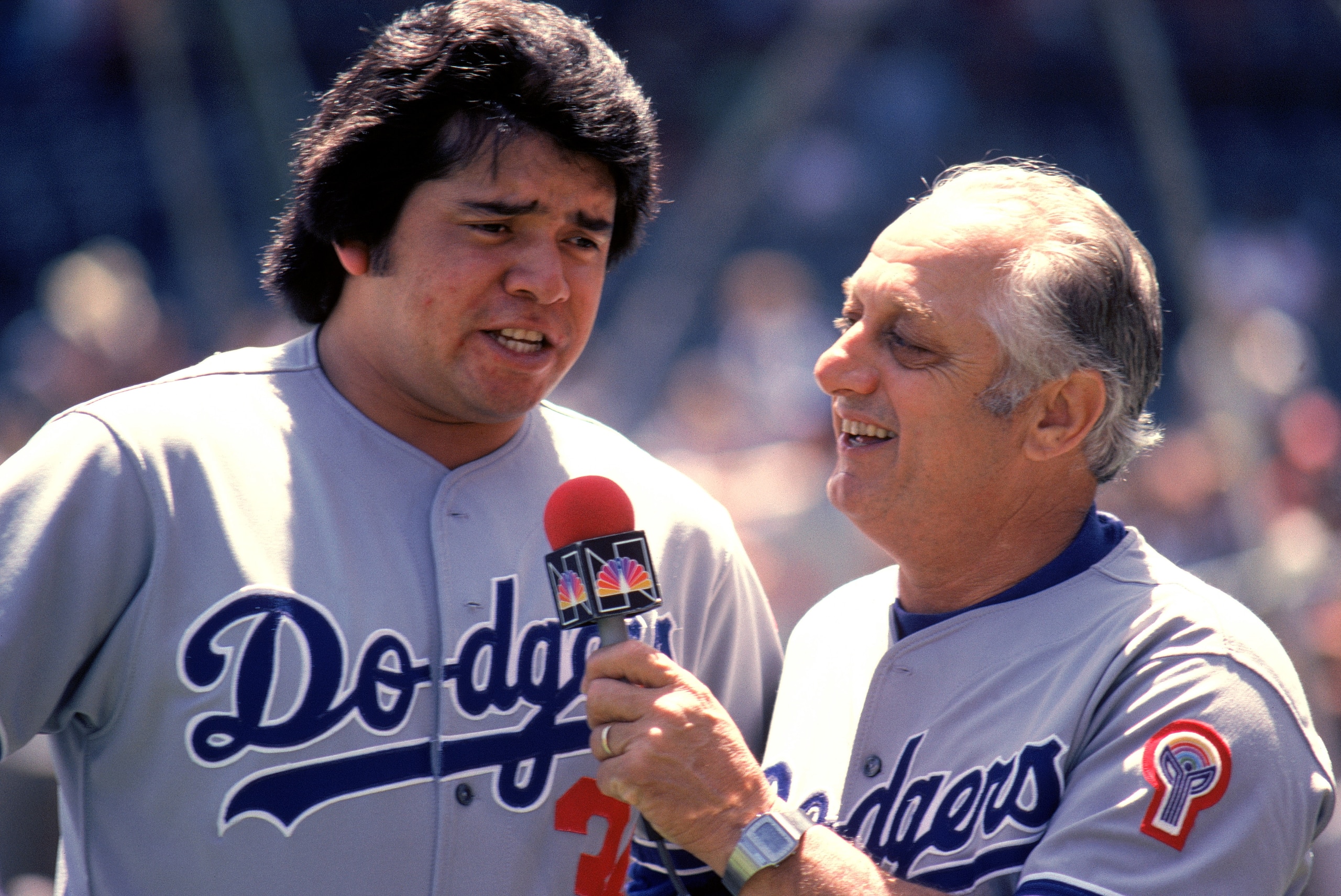 CHICAGO, IL - JUNE 7: Pitcher Fernando Valenzuela #34 of the Los Angeles Dodgers is interviewed by his manager Tommy Lasorda #2 before the game against the Chicago Cubs on June 7, 1981 at Wrigley Field in Chicago, Illinois. (Photo by Jonathan Daniel/Getty CHICAGO, IL - JUNE 7: Pitcher Fernando Valenzuela #34 of the Los Angeles Dodgers is interviewed by his manager Tommy Lasorda #2 before the game against the Chicago Cubs on June 7, 1981 at Wrigley Field in Chicago, Illinois. (Photo by Jonathan Daniel/Getty