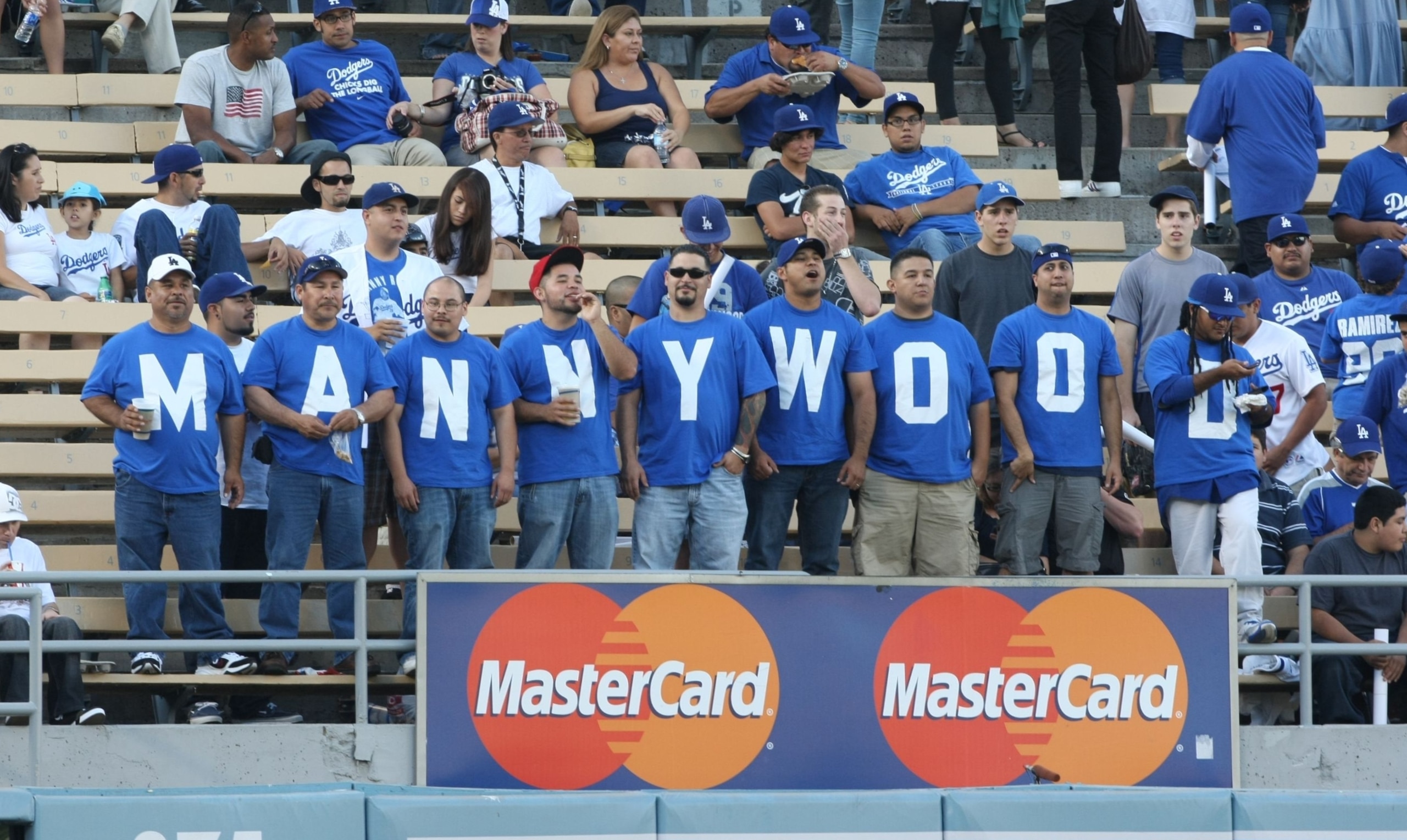 LOS ANGELES - JULY 16: Fans of the Los Angeles Dodgers looks on prior to the game against the Houston Astros on July 16, 2009 at Dodger Stadium in Los Angeles, California. (Photo by Stephen Dunn/Getty Images) LOS ANGELES - JULY 16: Fans of the Los Angeles Dodgers looks on prior to the game against the Houston Astros on July 16, 2009 at Dodger Stadium in Los Angeles, California. (Photo by Stephen Dunn/Getty Images)