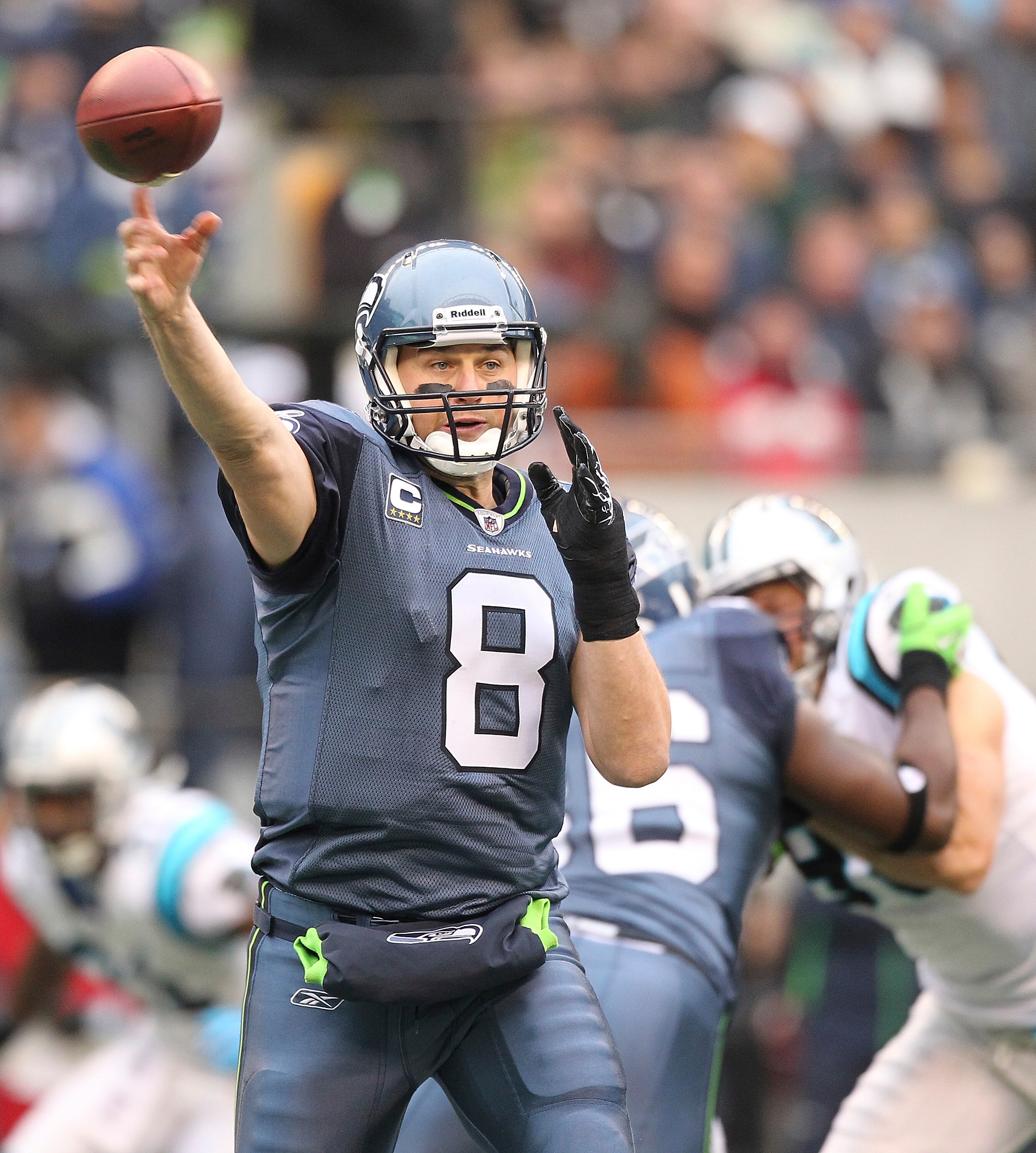 SEATTLE, WA - DECEMBER 05:  Quarterback Matt Hasselbeck #8 of the Seattle Seahawks passes against the Carolina Panthers at Qwest Field on December 5, 2010 in Seattle, Washington. (Photo by Otto Greule Jr/Getty Images)