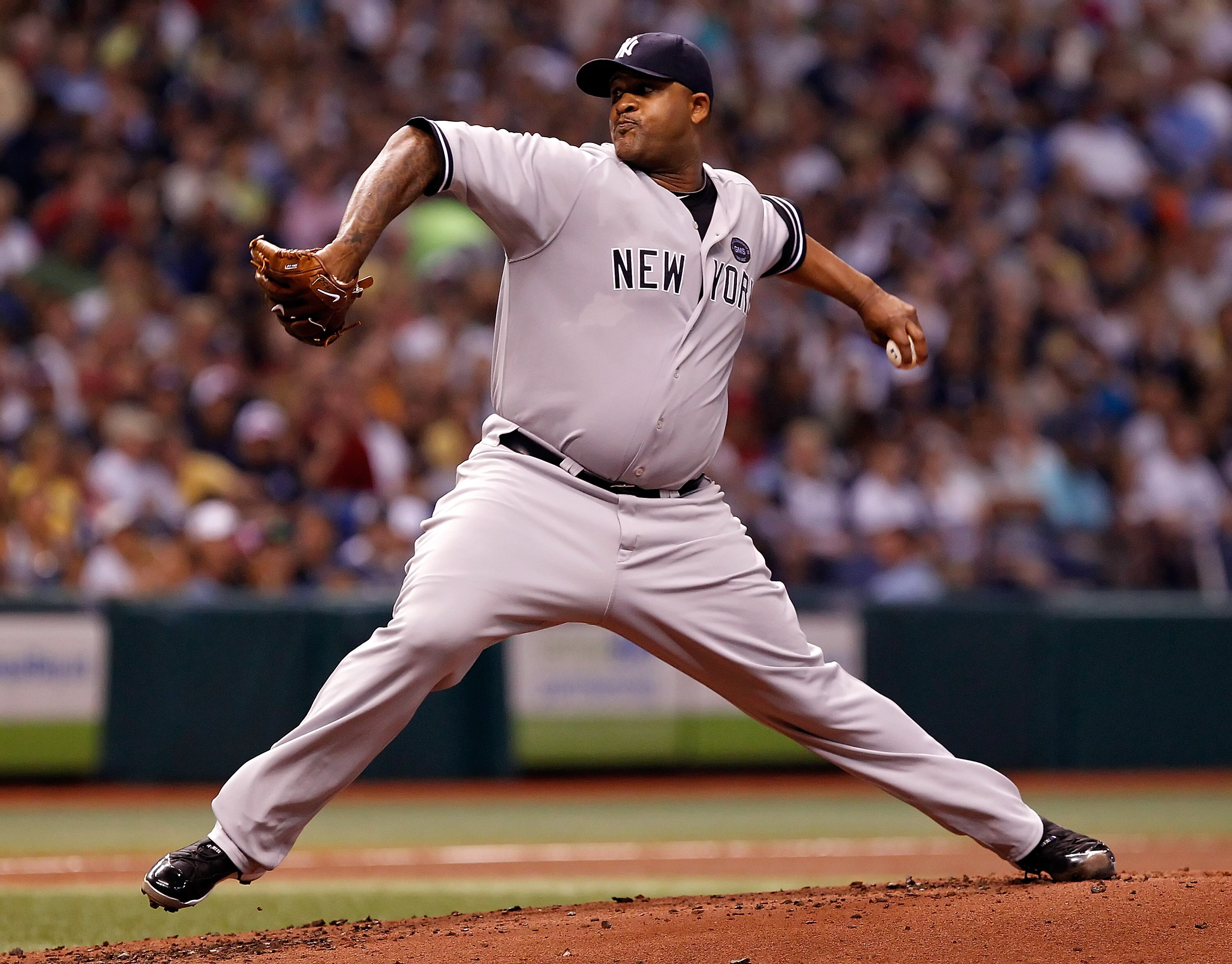 ST PETERSBURG, FL - SEPTEMBER 13:  C.C. Sabathia #52 of the New York Yankees pitches against the Tampa Bay Rays during the game at Tropicana Field on September 13, 2010 in St. Petersburg, Florida.  (Photo by J. Meric/Getty Images)